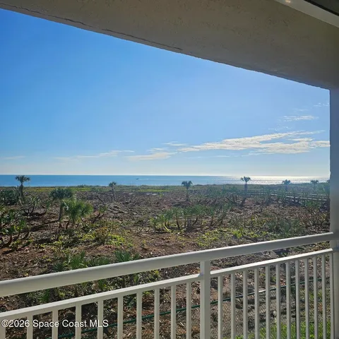 a view of a city with ocean view