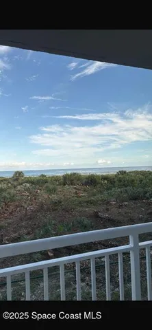 a view of a balcony with outdoor space