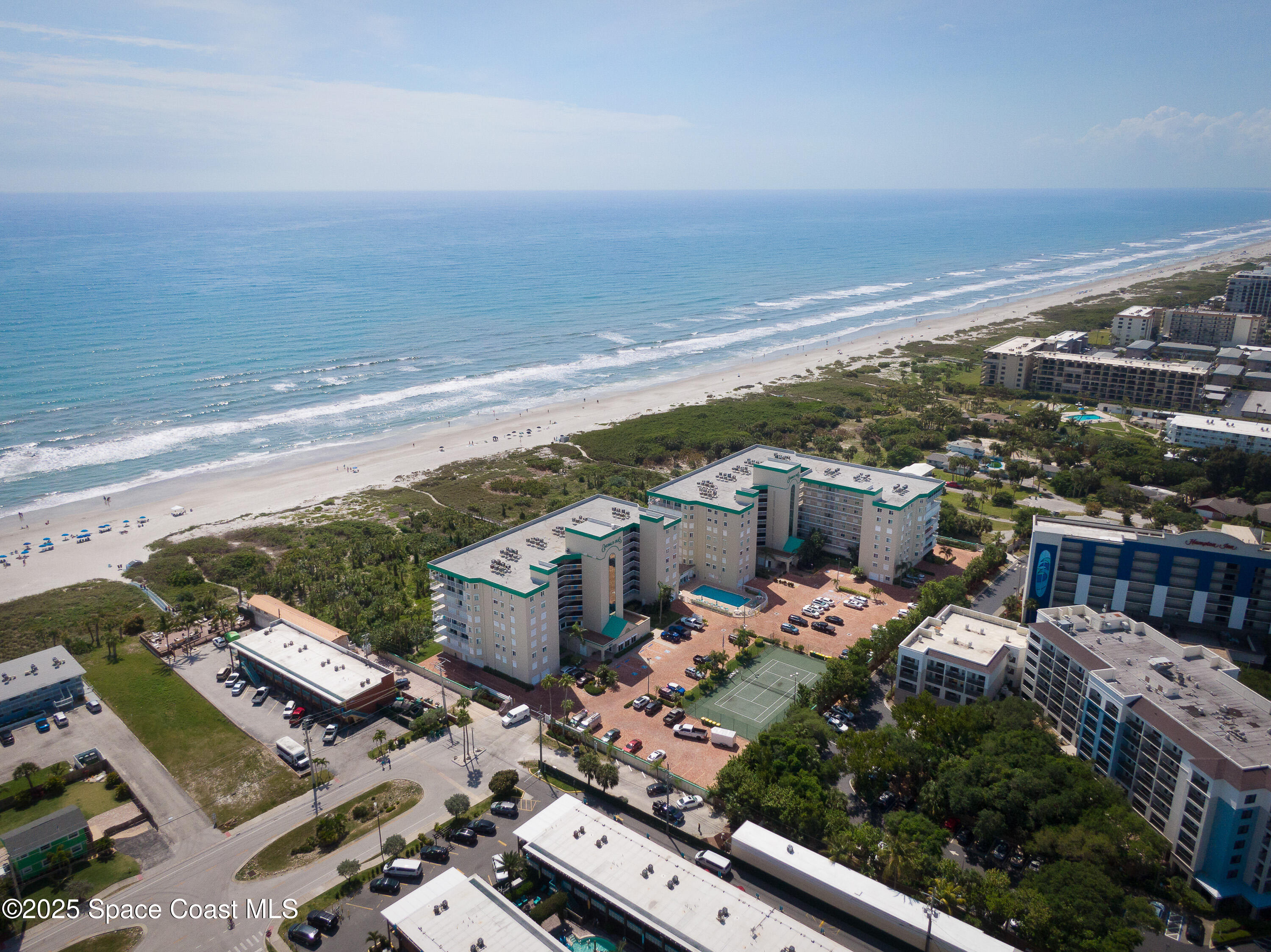 3450 Ocean Beach Boulevard, Unit 201 Cocoa Beach, FL 32931 - Photo 37 of 48 an aerial view of a house with a ocean view