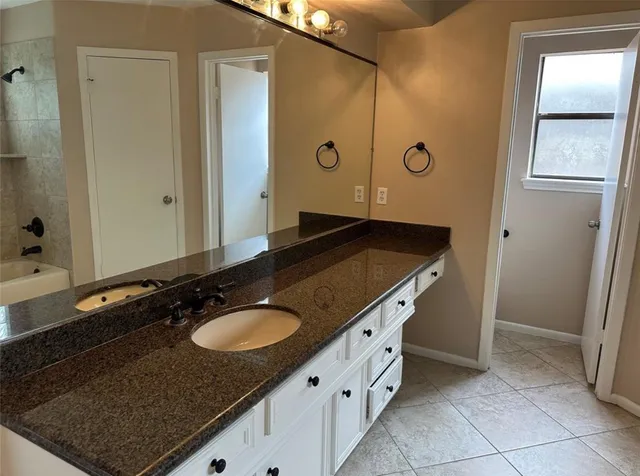 a view of a house with a garden