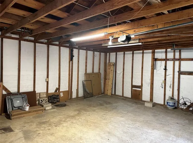 a view of a backyard with plants