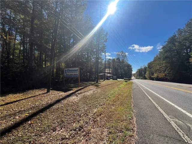 a view of a backyard of the house