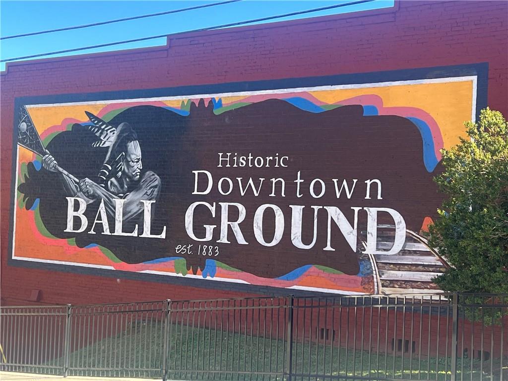 10494 Ball Ground Highway Ball Ground, GA 30107 - Photo 10 of 11 a sign that is on the side of a building