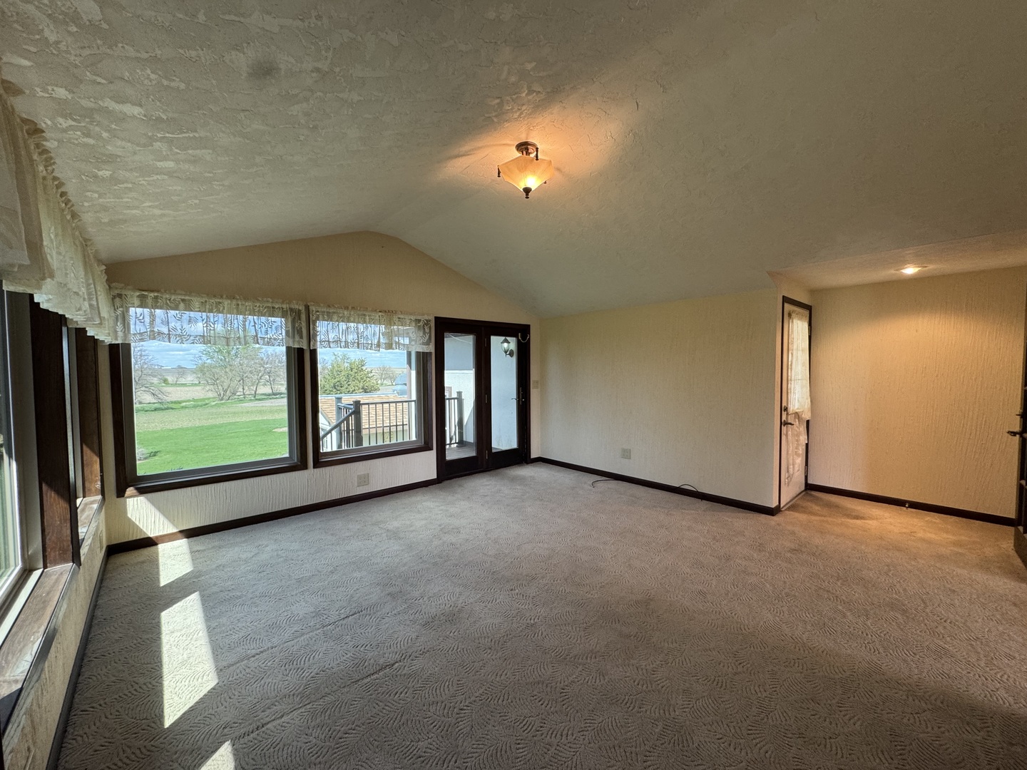 4340 230th Street Walcott, IA 52773 - Photo 24 of 67 wooden floor in an empty room with a window