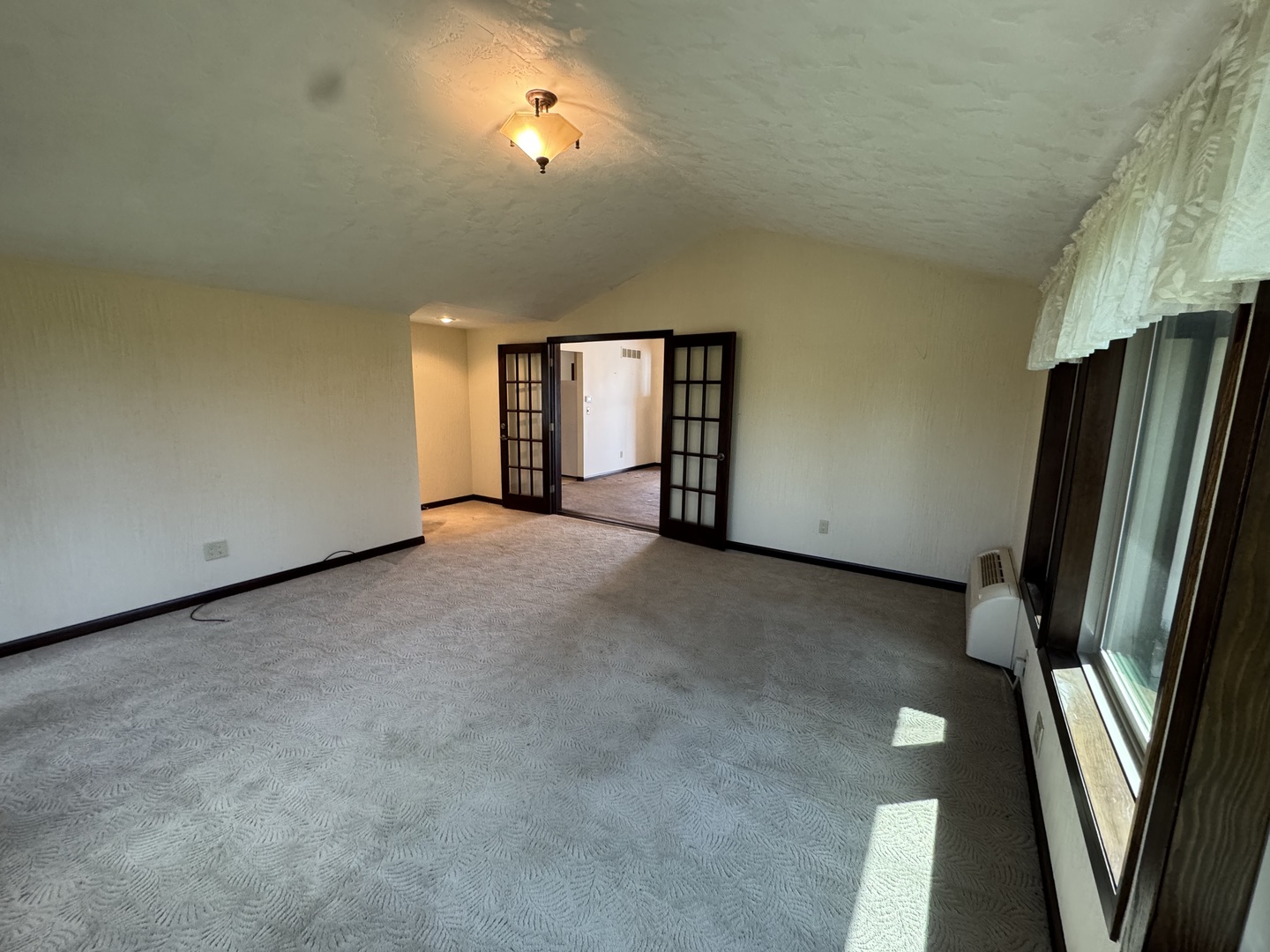 4340 230th Street Walcott, IA 52773 - Photo 25 of 67 a view of an empty room with a window