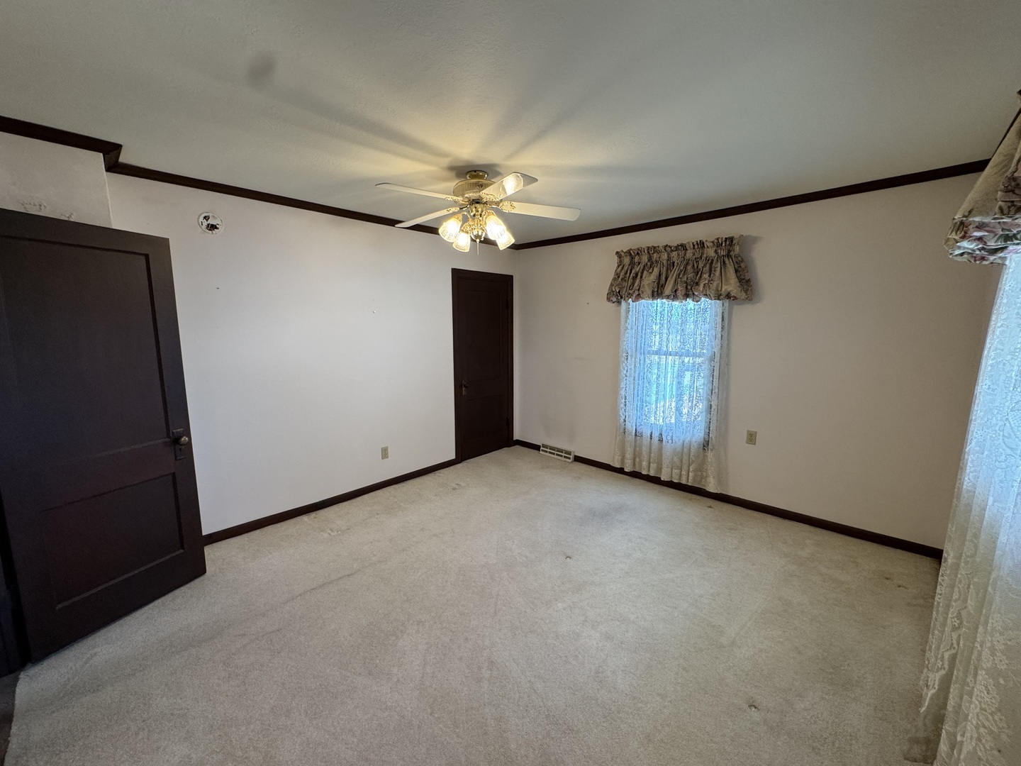 4340 230th Street Walcott, IA 52773 - Photo 33 of 67 a view of an empty room with a window