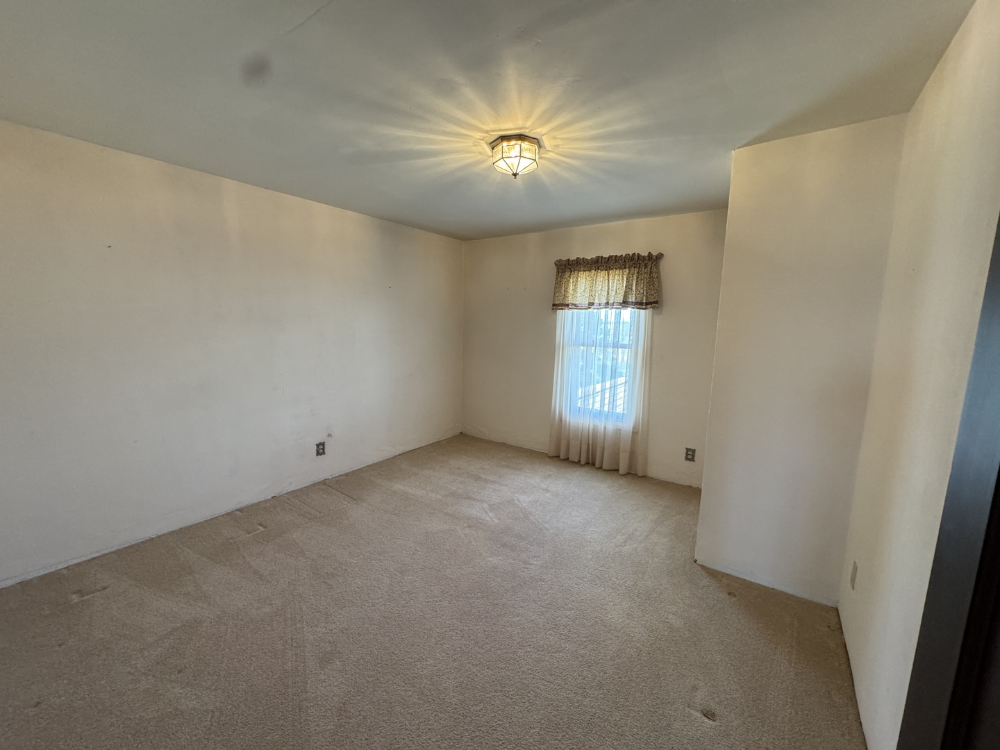4340 230th Street Walcott, IA 52773 - Photo 35 of 67 an empty room with a empty space and window