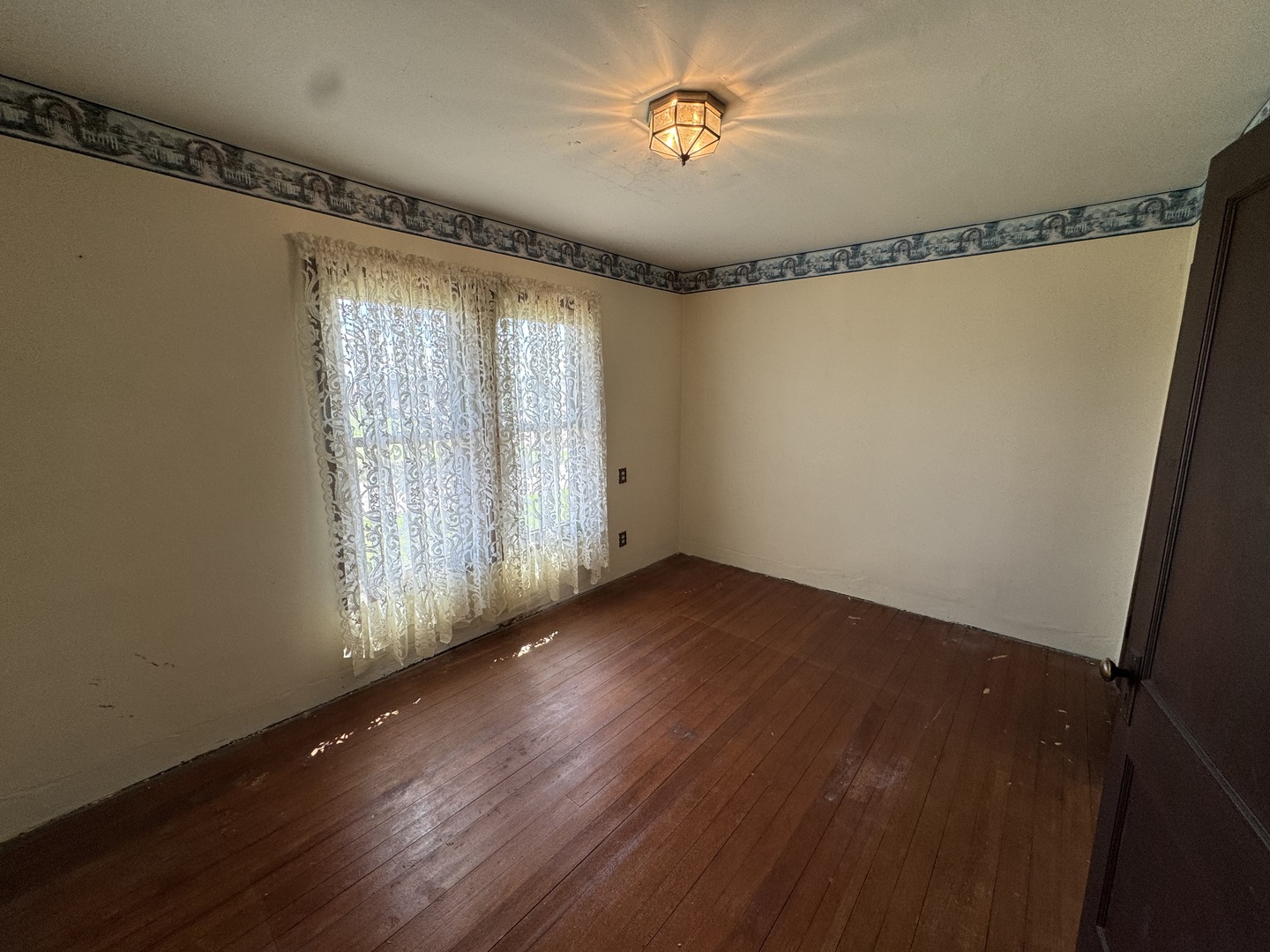 4340 230th Street Walcott, IA 52773 - Photo 37 of 67 a view of an empty room with a window