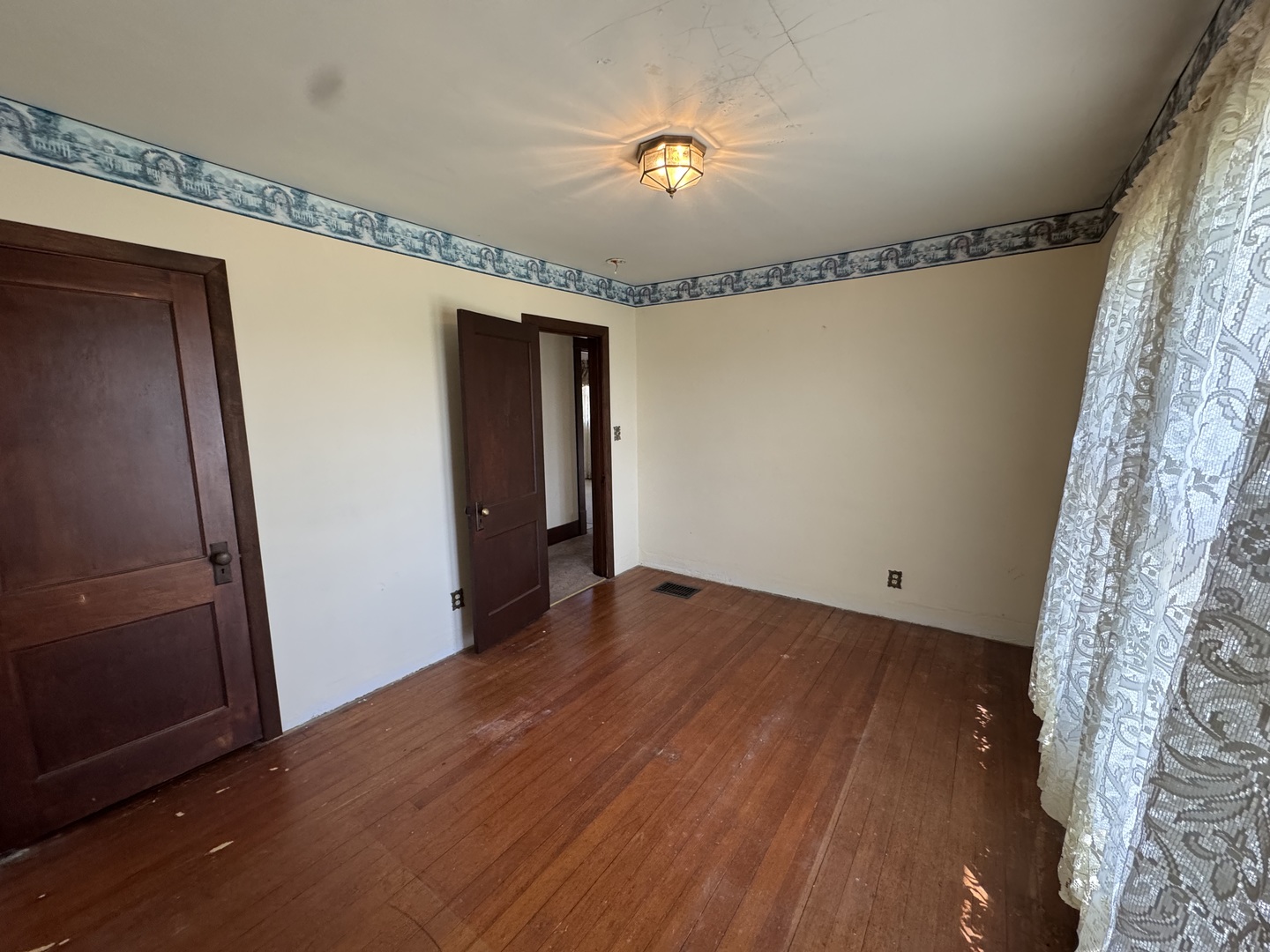 4340 230th Street Walcott, IA 52773 - Photo 39 of 67 a view of empty room with wooden floor