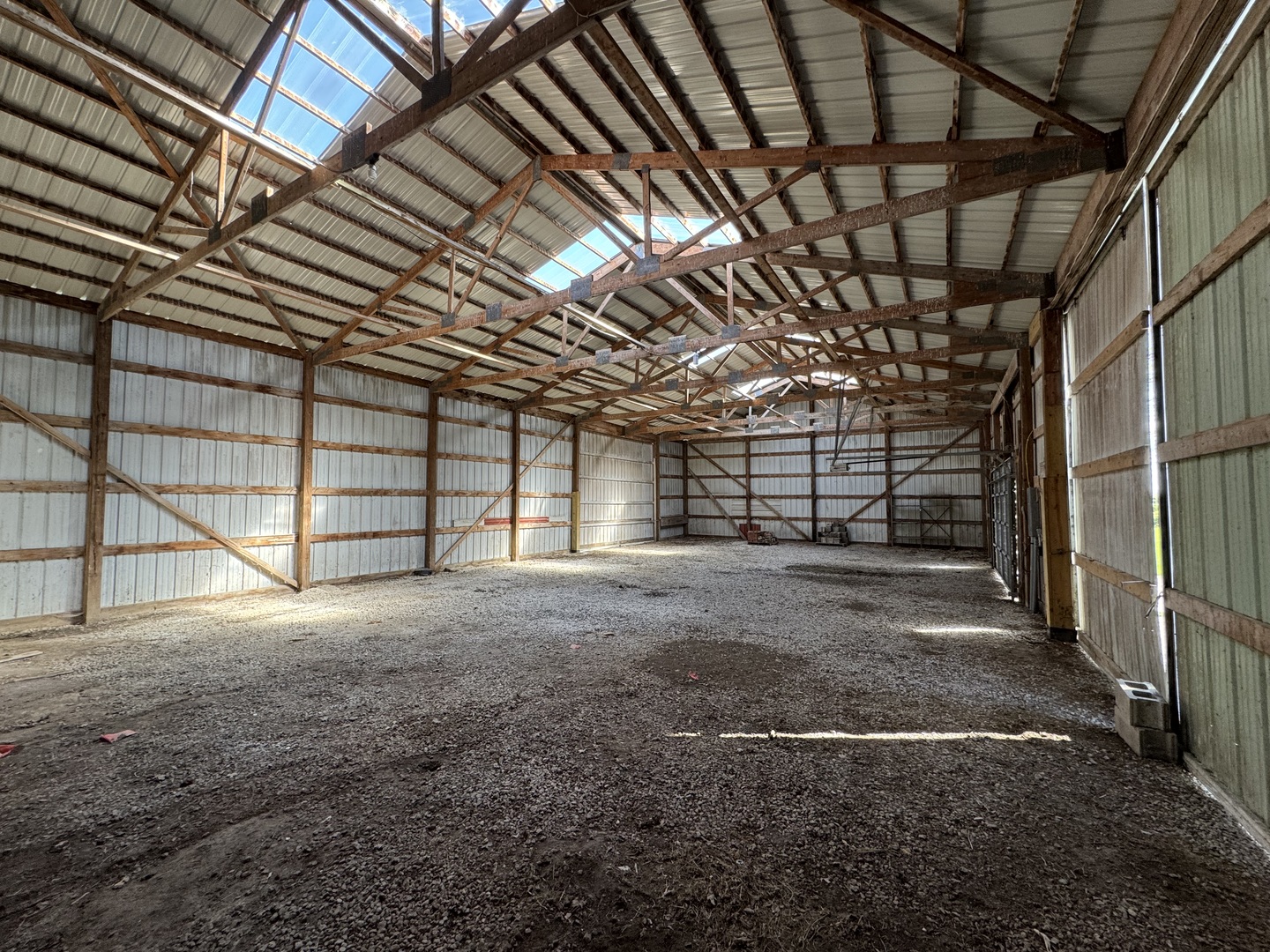 4340 230th Street Walcott, IA 52773 - Photo 59 of 67 a view of empty room with wooden floor