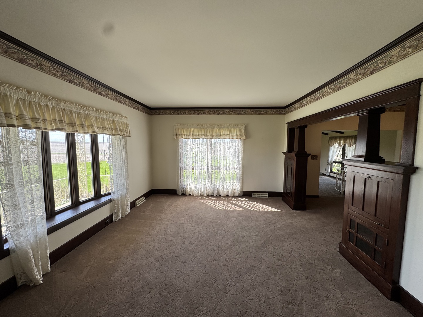 4340 230th Street Walcott, IA 52773 - Photo 10 of 67 a view of a room with large windows