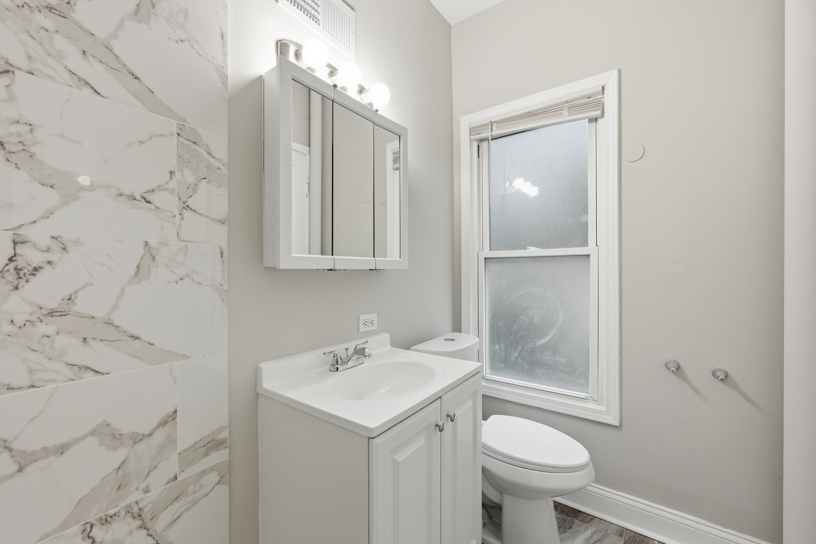 835 Oak Street Elgin, IL 60123 - Photo 20 of 41 a bathroom with a sink toilet and shower