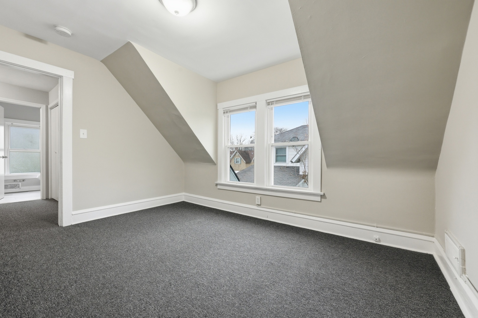 835 Oak Street Elgin, IL 60123 - Photo 28 of 41 an empty room with windows