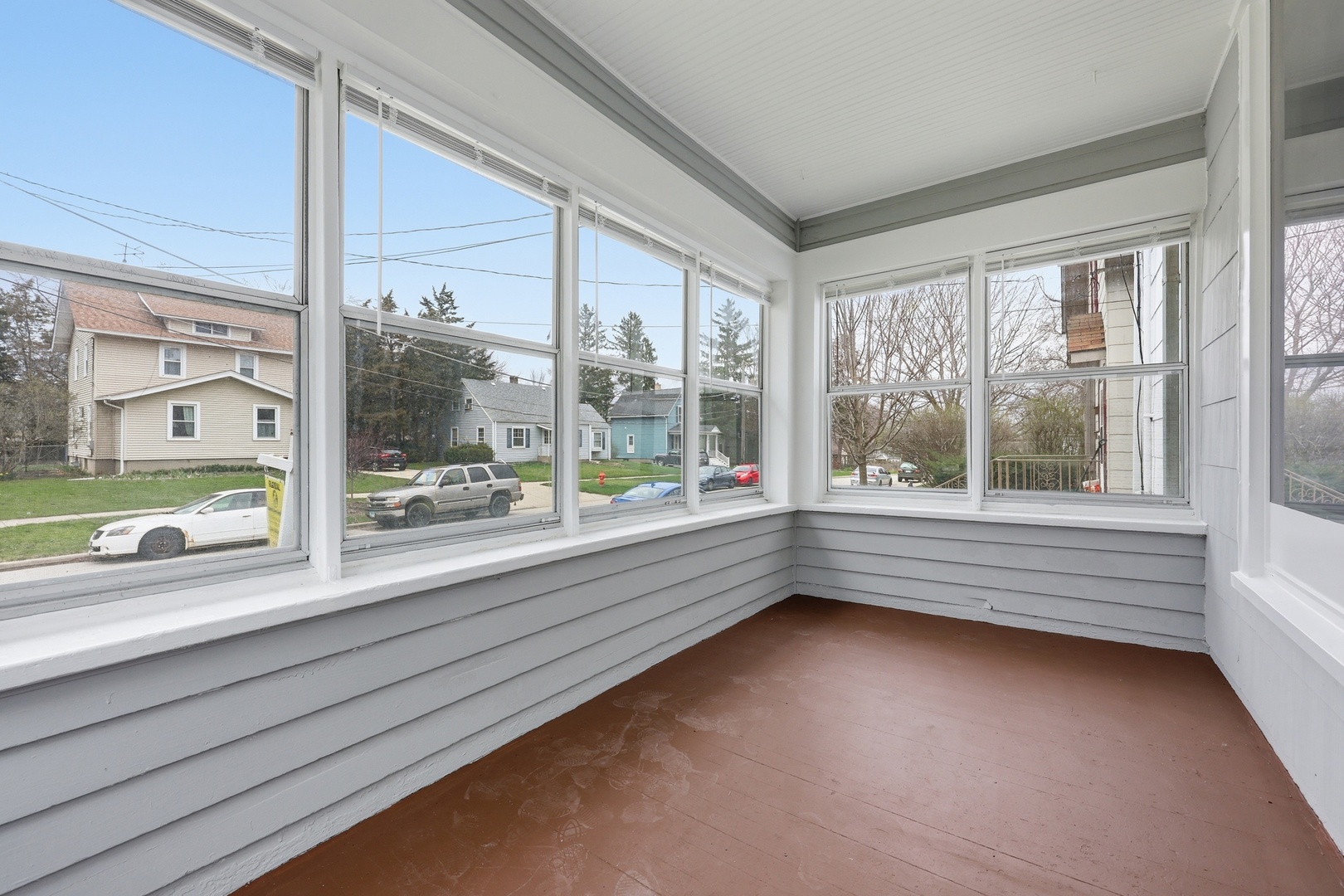 835 Oak Street Elgin, IL 60123 - Photo 3 of 41 a view of lot of windows in an empty room