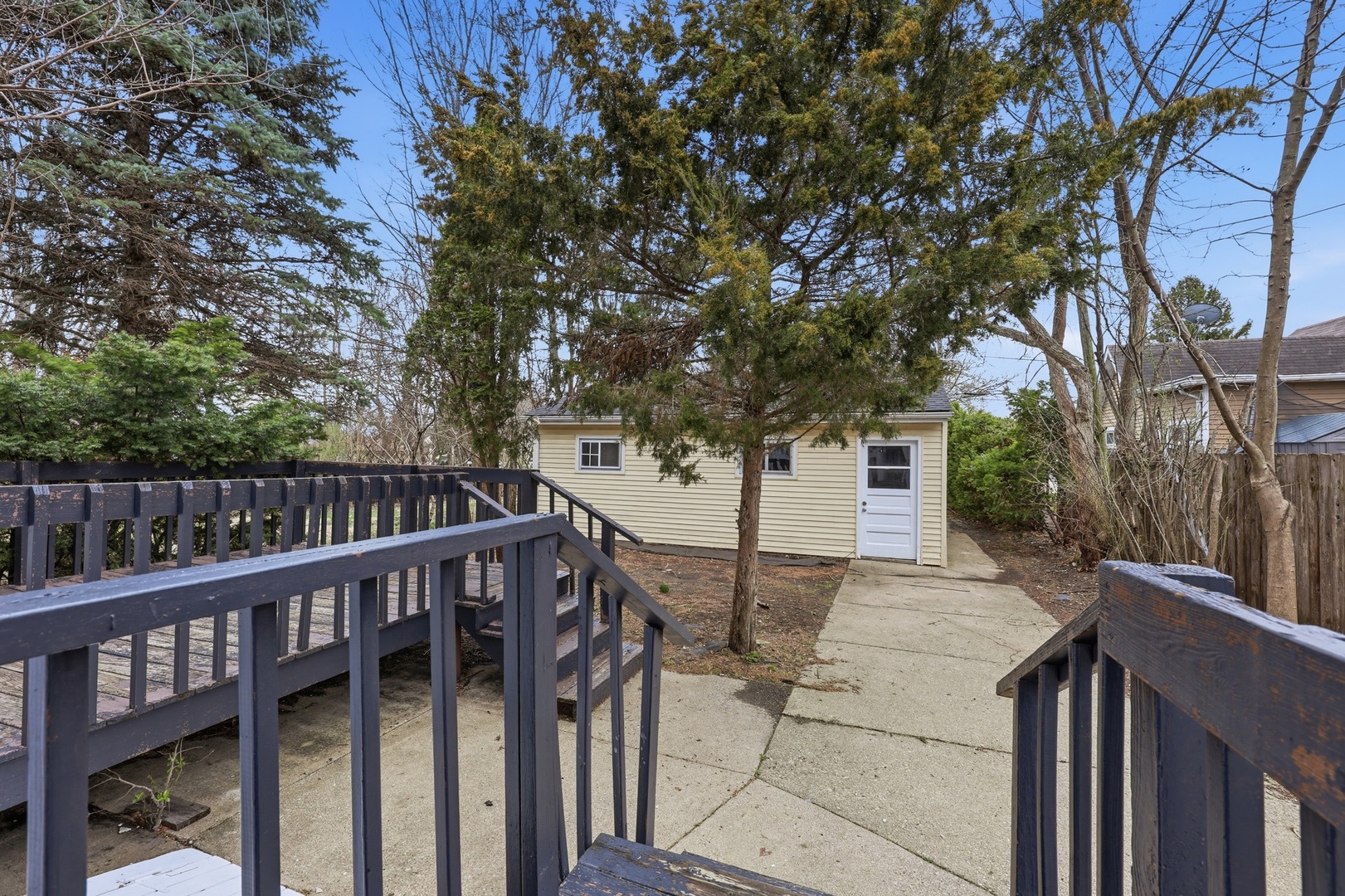 835 Oak Street Elgin, IL 60123 - Photo 31 of 41 a view of a wooden deck and a backyard
