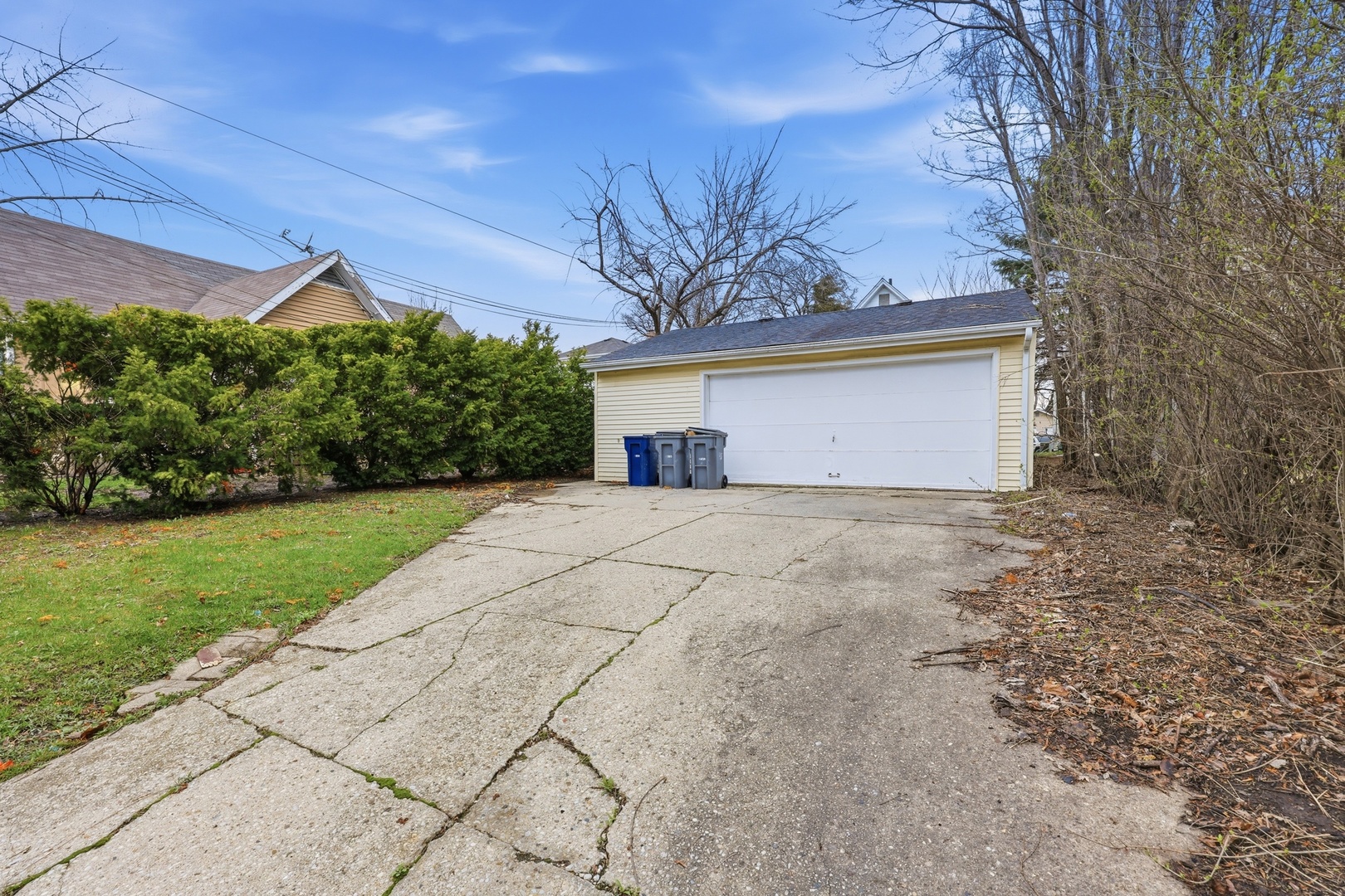 835 Oak Street Elgin, IL 60123 - Photo 38 of 41 a front view of house with yard and trees all around