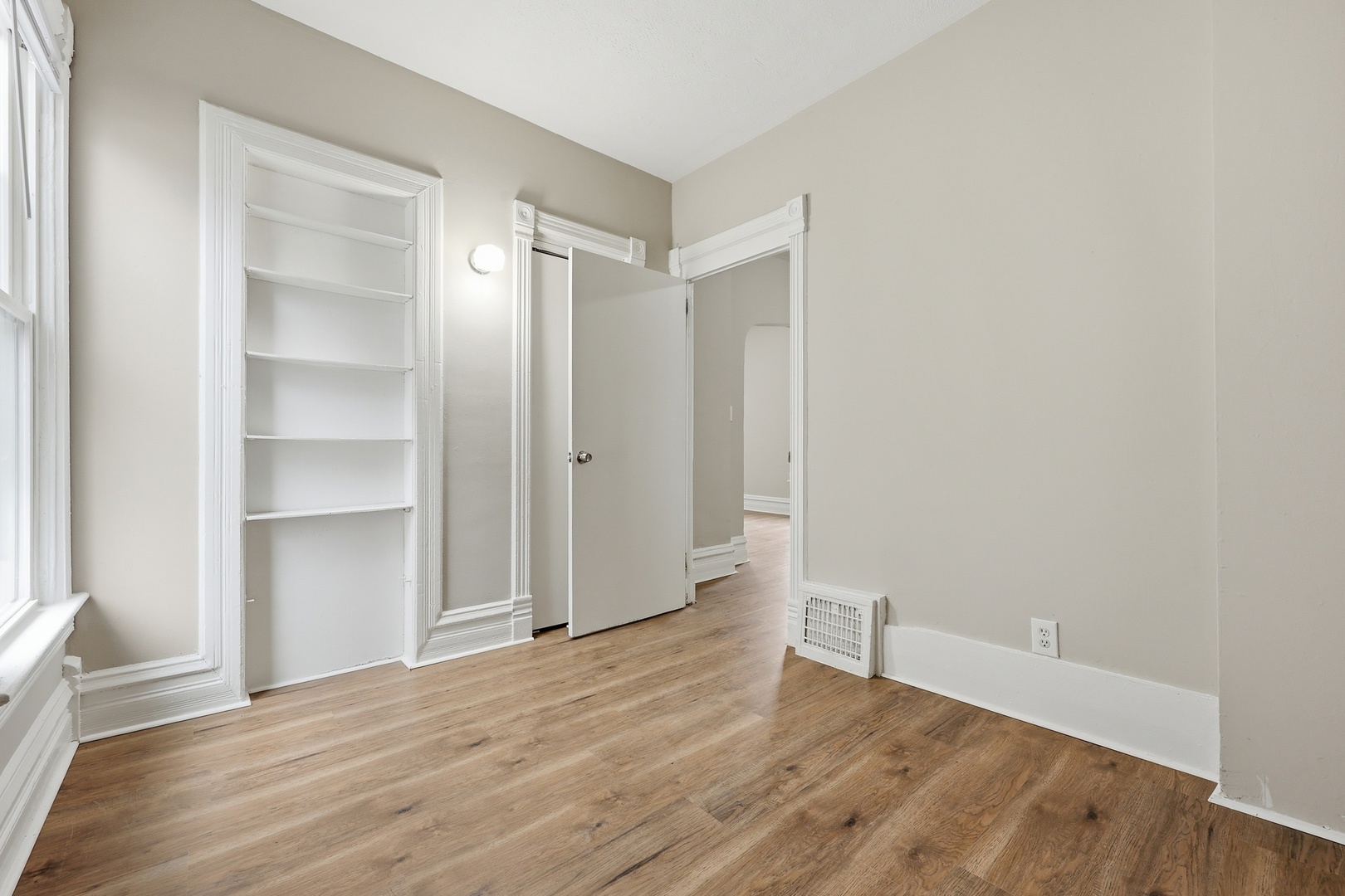 835 Oak Street Elgin, IL 60123 - Photo 10 of 41 a view of an empty room with wooden floor