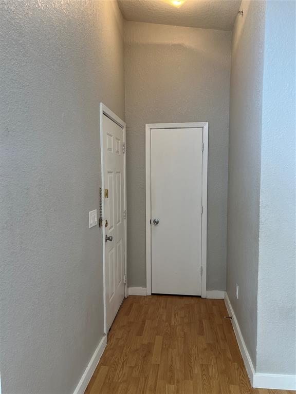 701 West Sycamore Street, Unit 303 Denton, TX 76201 - Photo 10 of 12 Here is the foyer. Notice the hall closet which allows easy access to hanging coats and grabbing umbrellas before heading out.