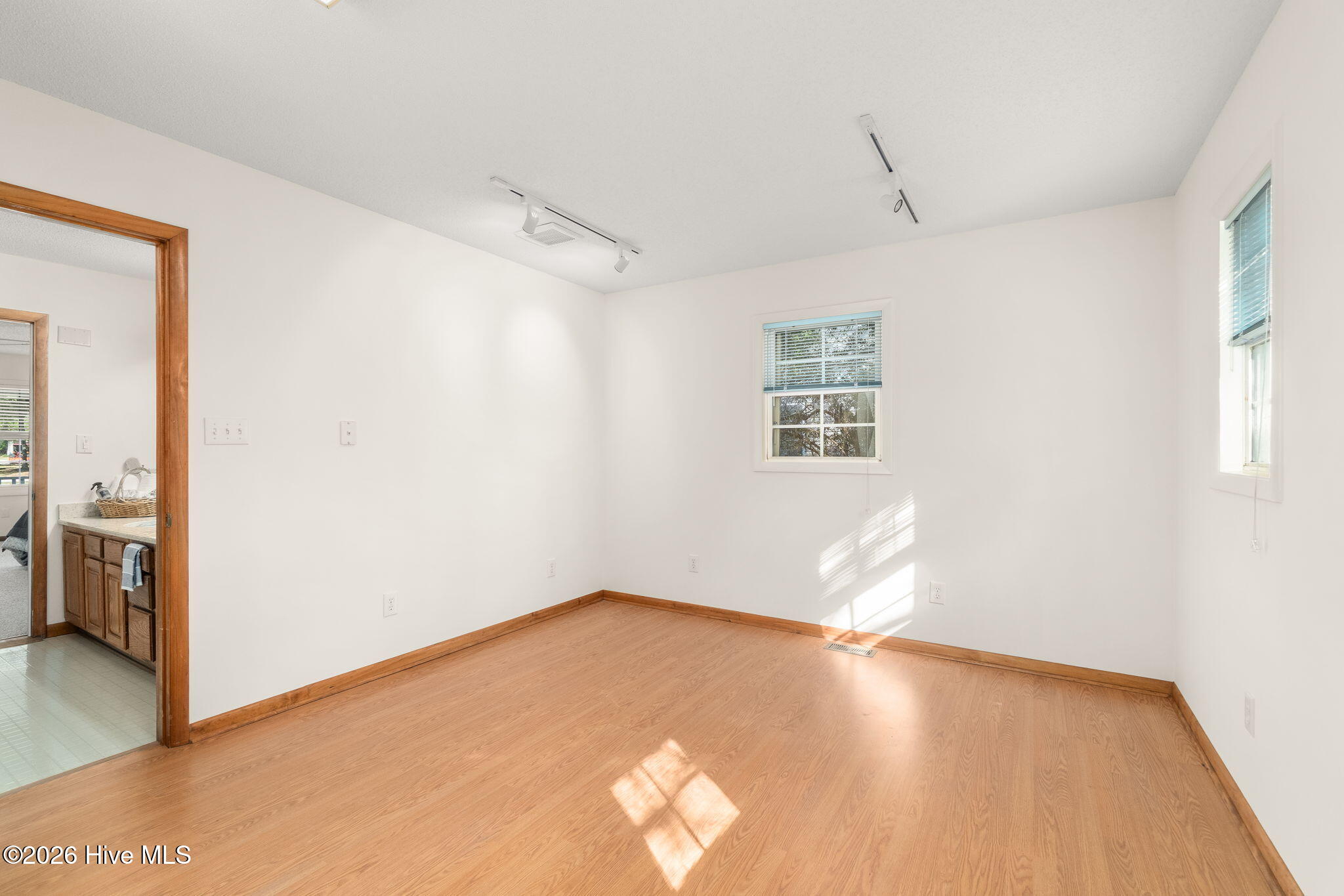175 Cedar Lane Newport, NC 28570 - Photo 11 of 30 sewing room 1 to bath