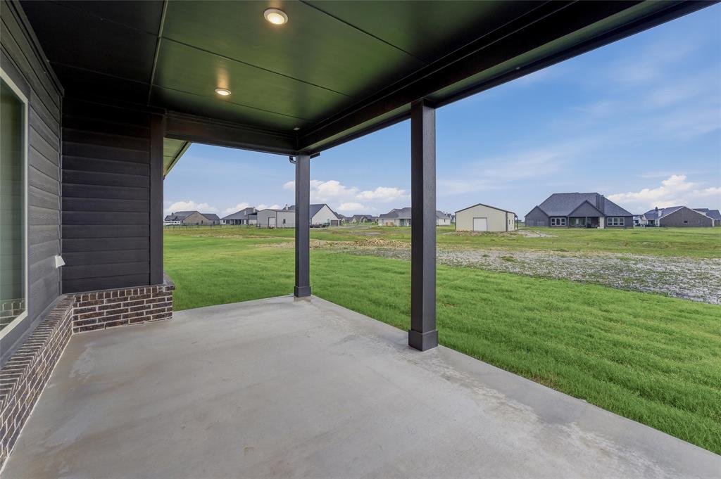 2208 Continent Court Krum, TX 76249 - Photo 21 of 26 Covered concrete patio featuring recessed lighting