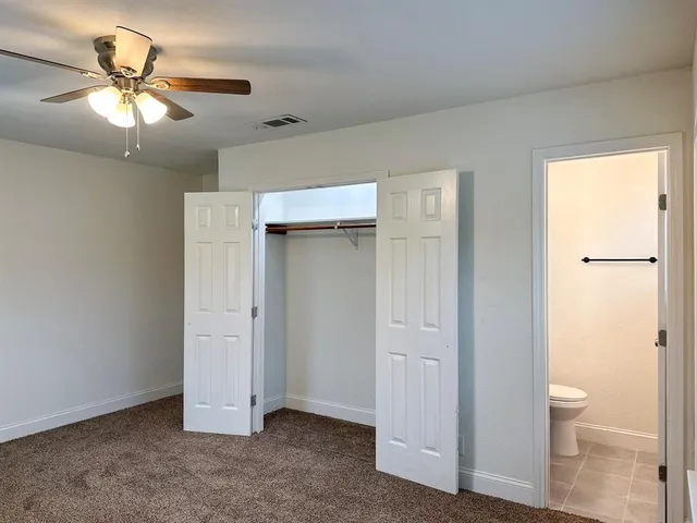 a view of a bathroom with a toilet