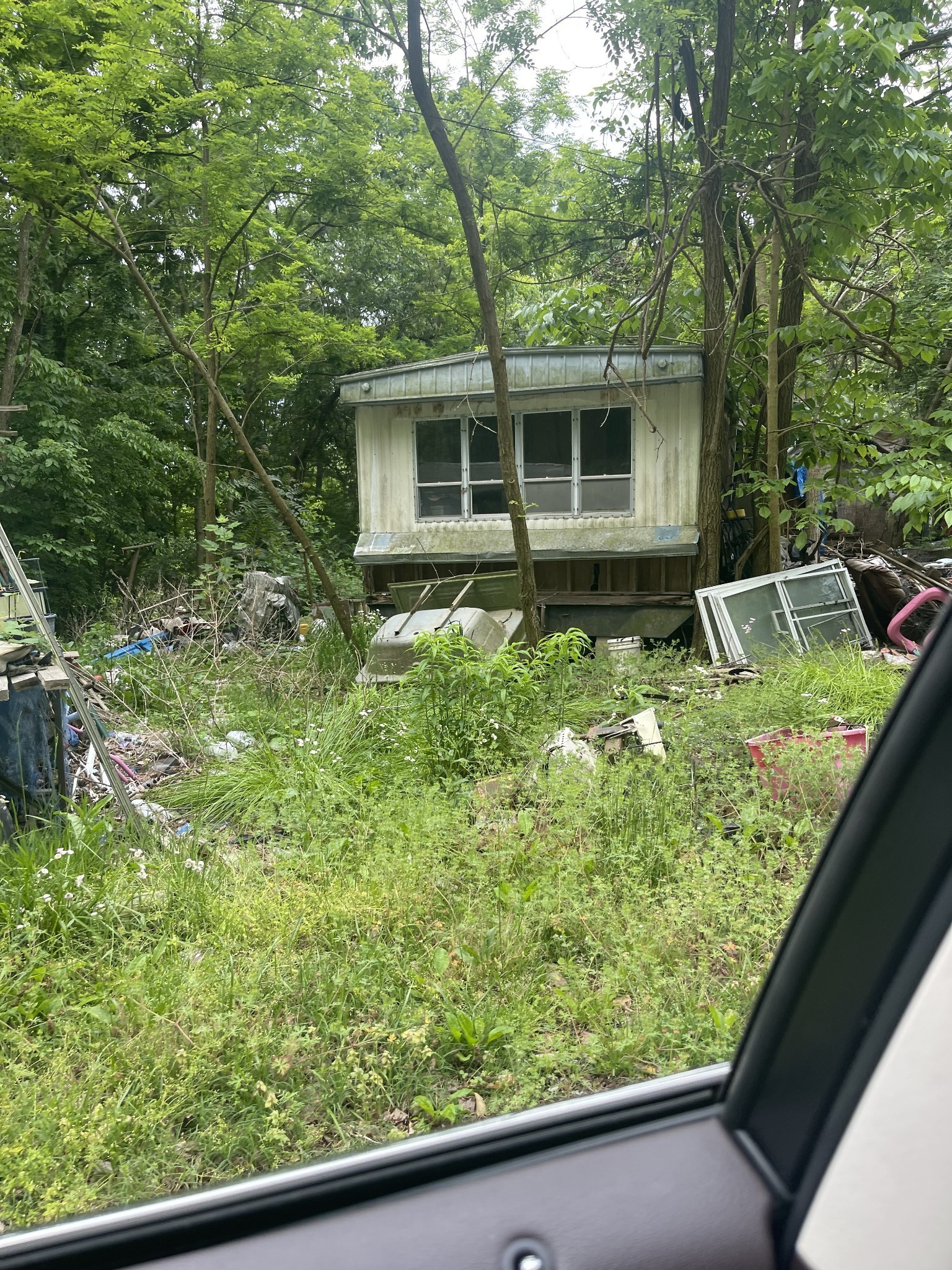 619 Parsley Road Smithville, TN 37166 - Photo 3 of 5 a house view with a garden space