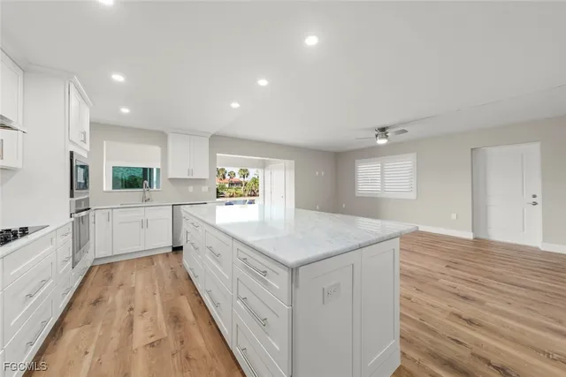 a view of a room that has a window in it