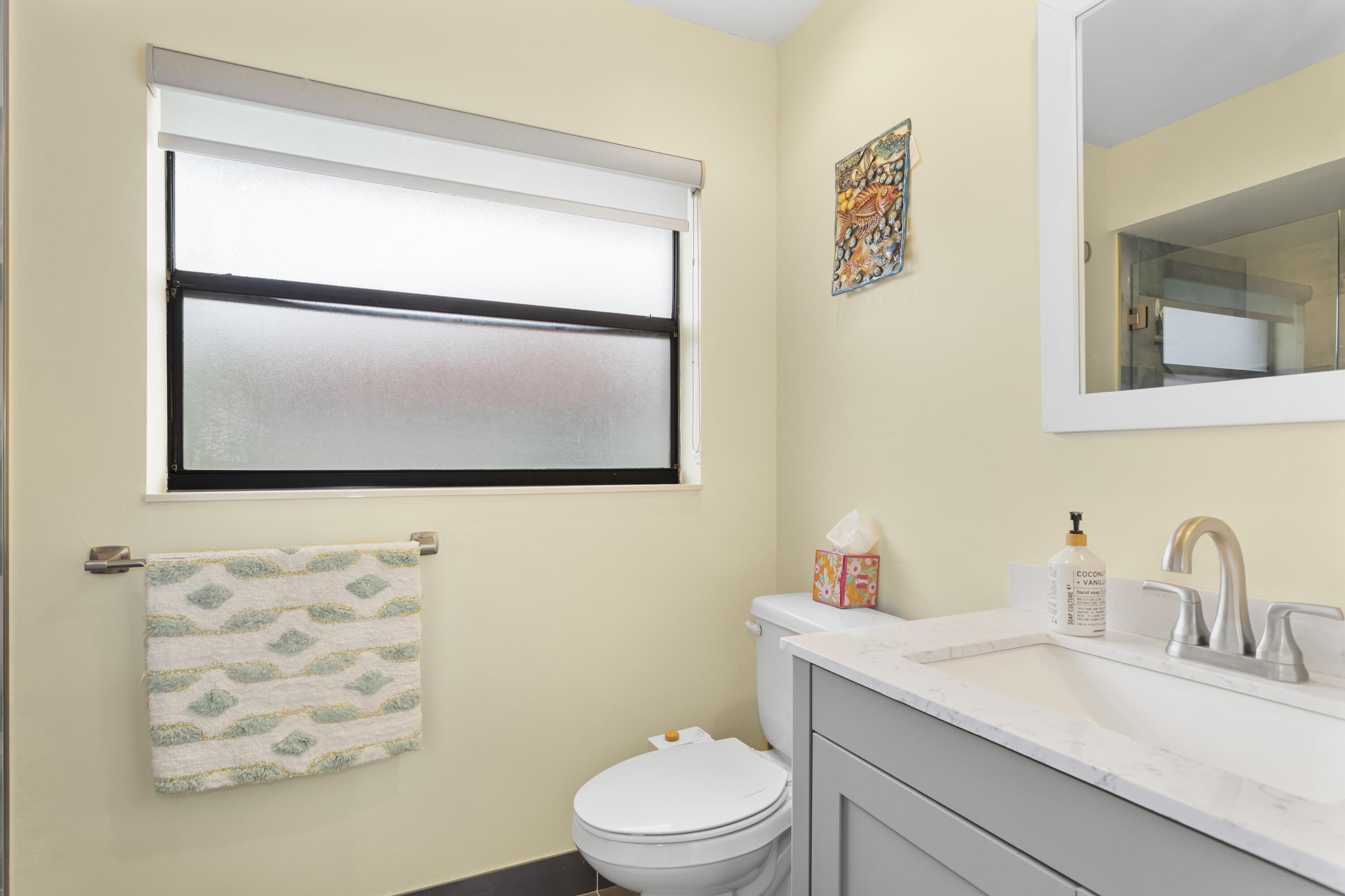 5789 Fox Hollow Drive, Unit B Boca Raton, FL 33486 - Photo 19 of 25 Primary Bathroom Vanity/Shower