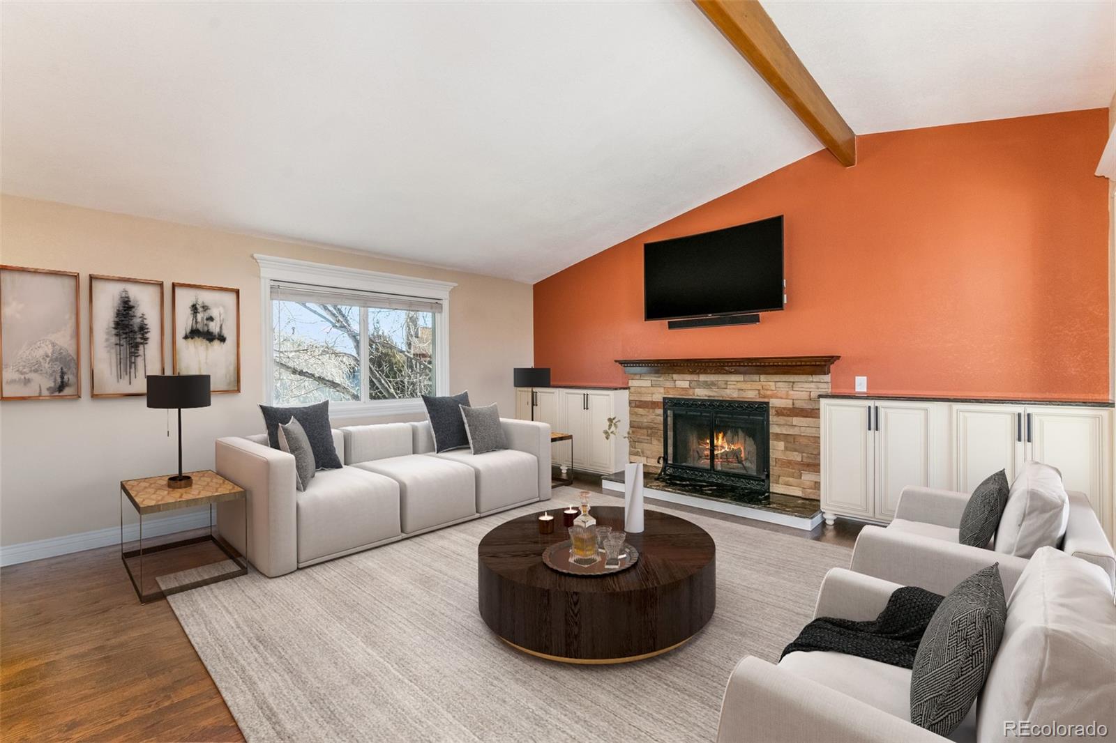 9164 Bitterweed Court Highlands Ranch, CO 80126 - Photo 2 of 27 a living room with furniture a fireplace and a flat screen tv