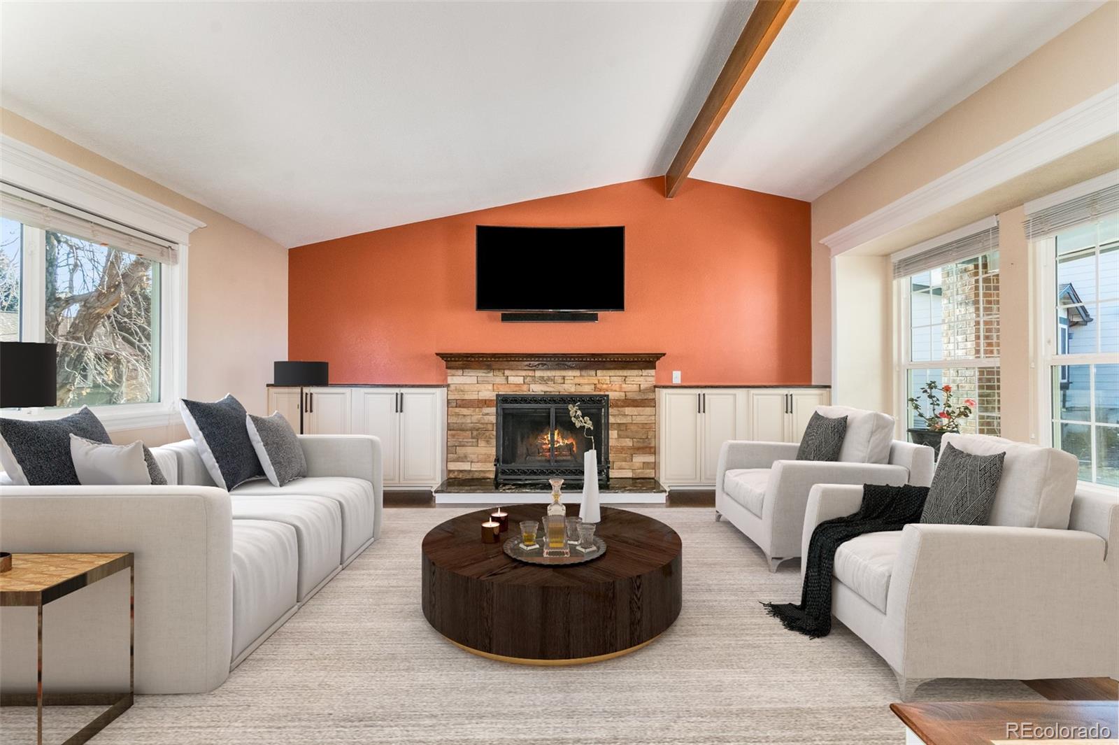 9164 Bitterweed Court Highlands Ranch, CO 80126 - Photo 3 of 27 a living room with furniture and a fireplace