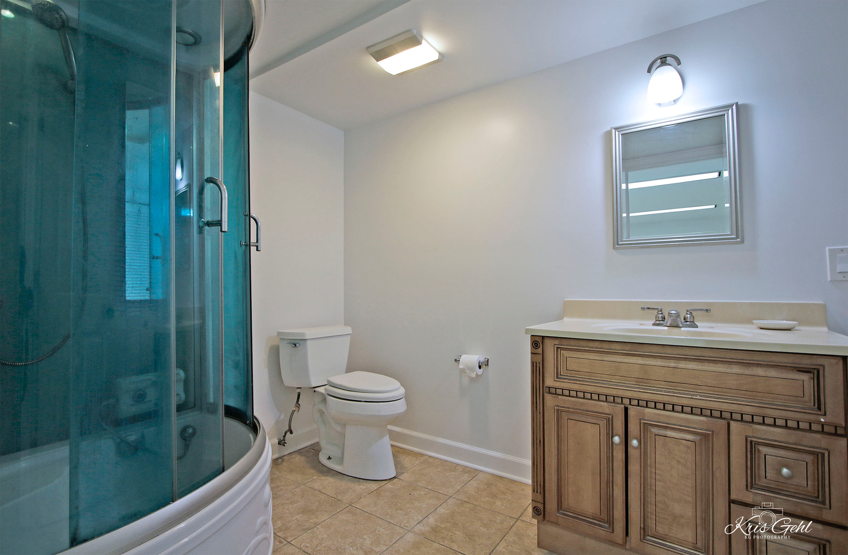 416 Arrow Trail, Unit 416 Wheeling, IL 60090 - Photo 17 of 24 a bathroom with a granite countertop sink a toilet and shower