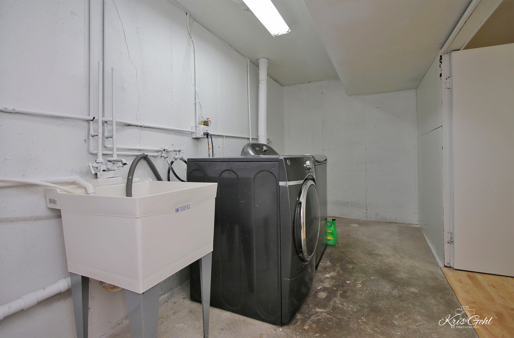 416 Arrow Trail, Unit 416 Wheeling, IL 60090 - Photo 18 of 24 a close view of a sink a refrigerator and cabinets