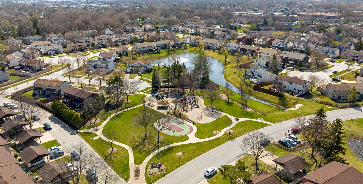 416 Arrow Trail, Unit 416 Wheeling, IL 60090 - Photo 23 of 24 an aerial view of a swimming pool with outdoor seating