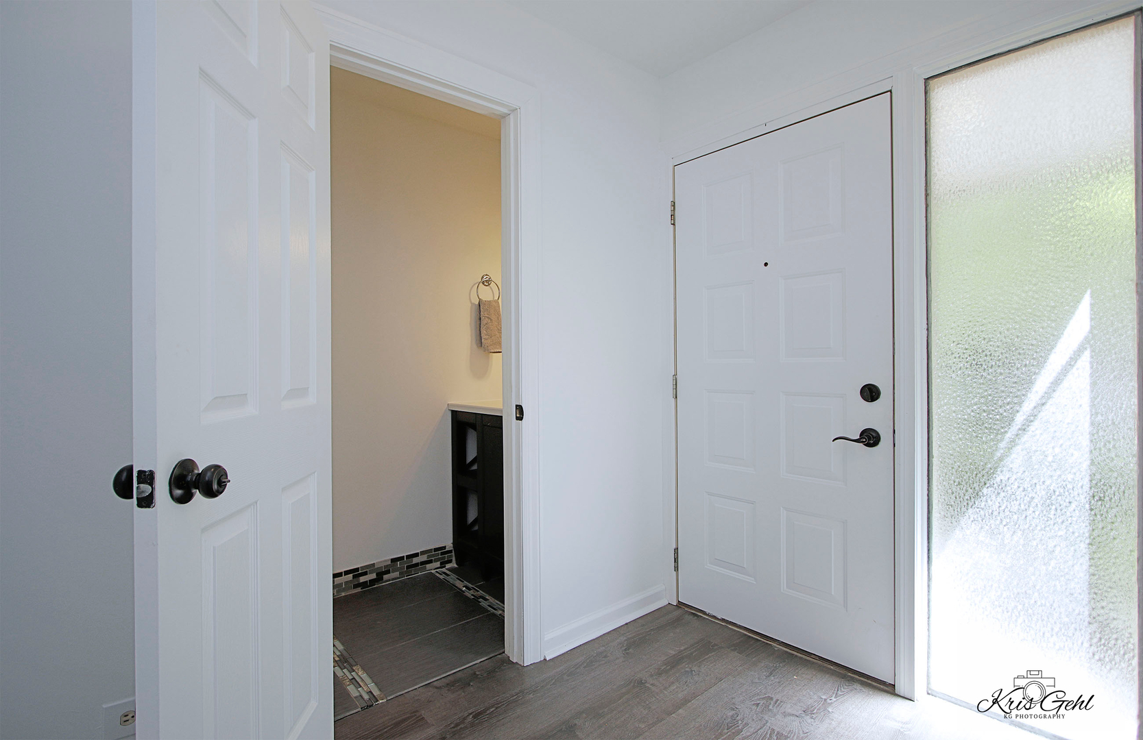 416 Arrow Trail, Unit 416 Wheeling, IL 60090 - Photo 9 of 24 a view of a hallway with wooden floor
