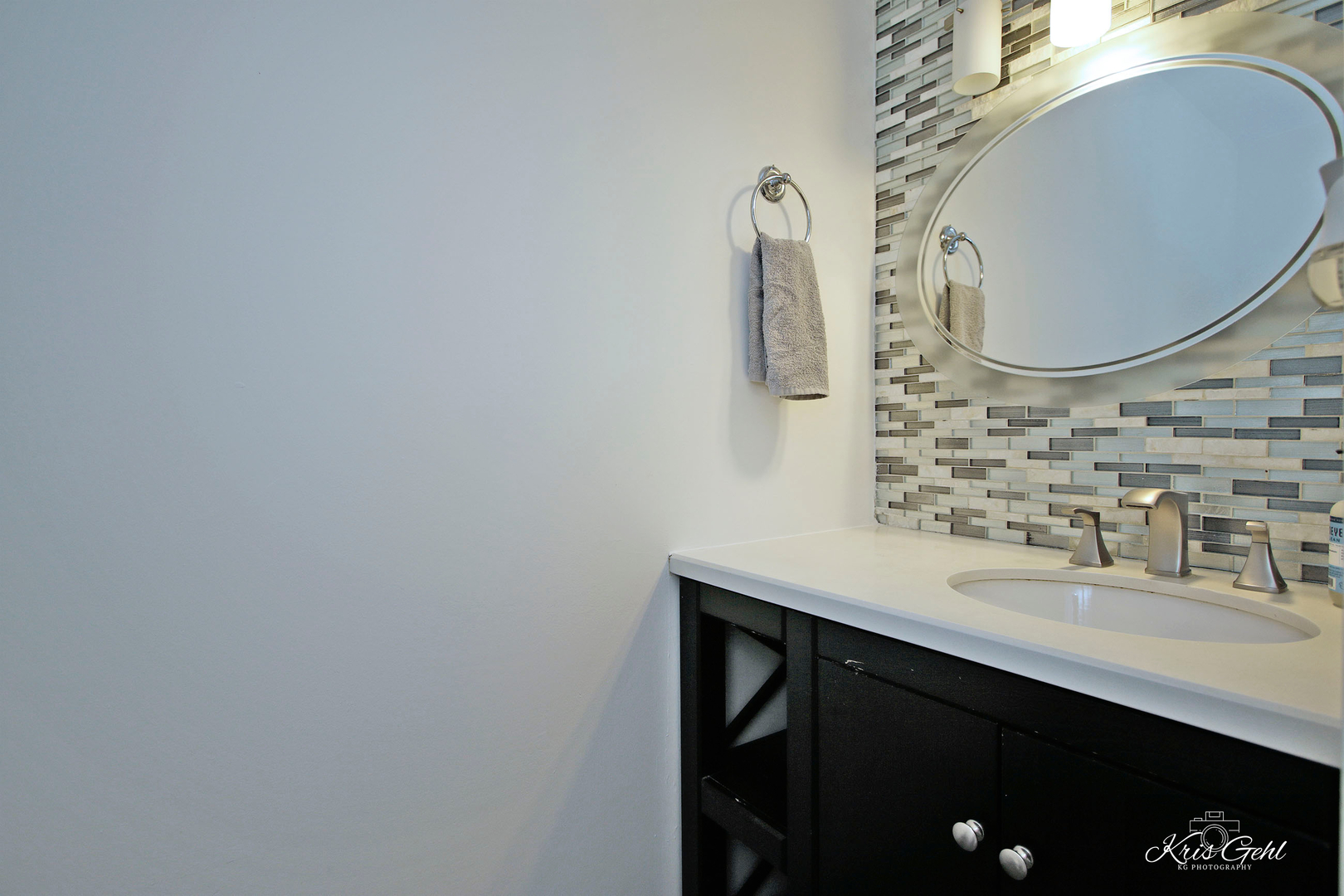 416 Arrow Trail, Unit 416 Wheeling, IL 60090 - Photo 10 of 24 a bathroom with a sink and a mirror