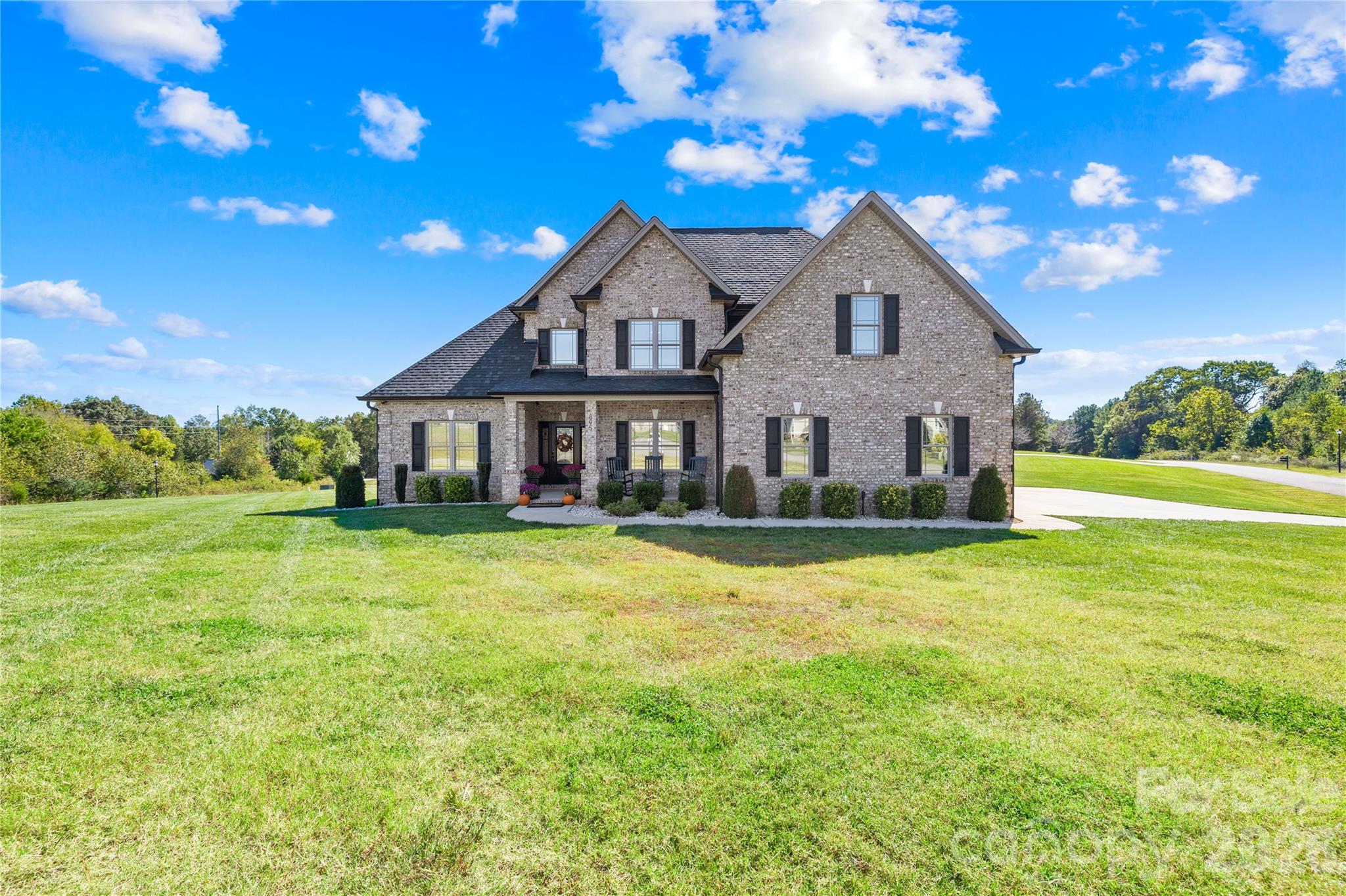 895 Oak Ridge Farms Circle Newton, NC 28658 - Photo 11 of 43 a front view of a house with yard