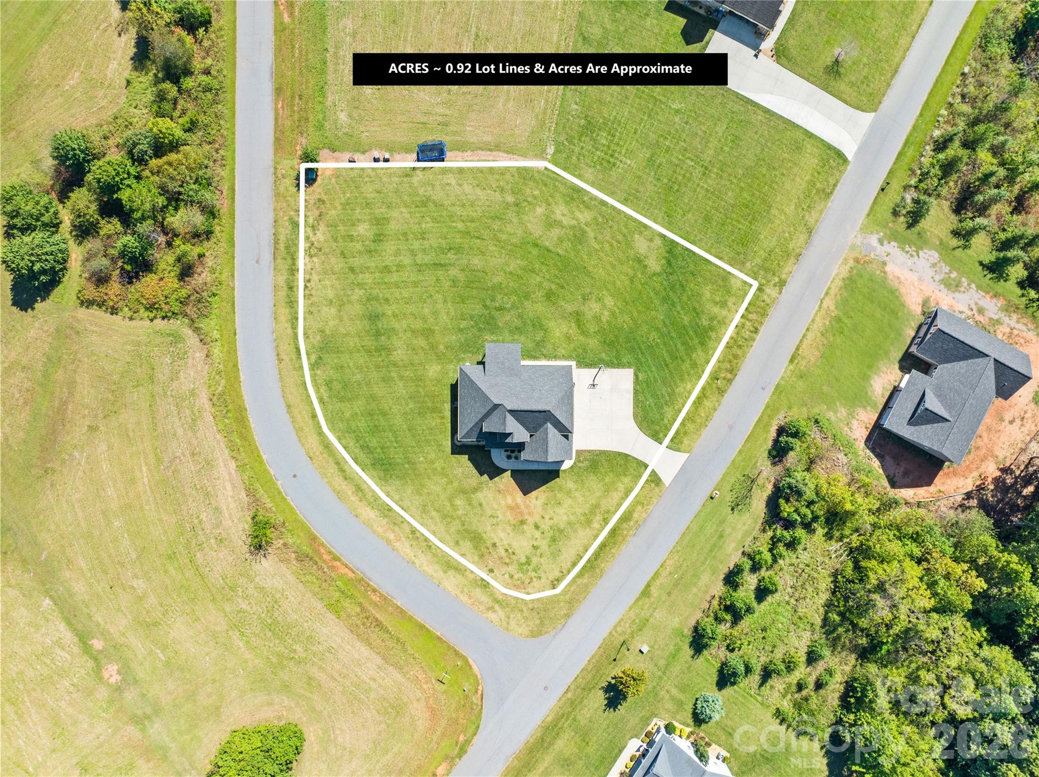 895 Oak Ridge Farms Circle Newton, NC 28658 - Photo 13 of 43 a view of a swimming pool with seating area