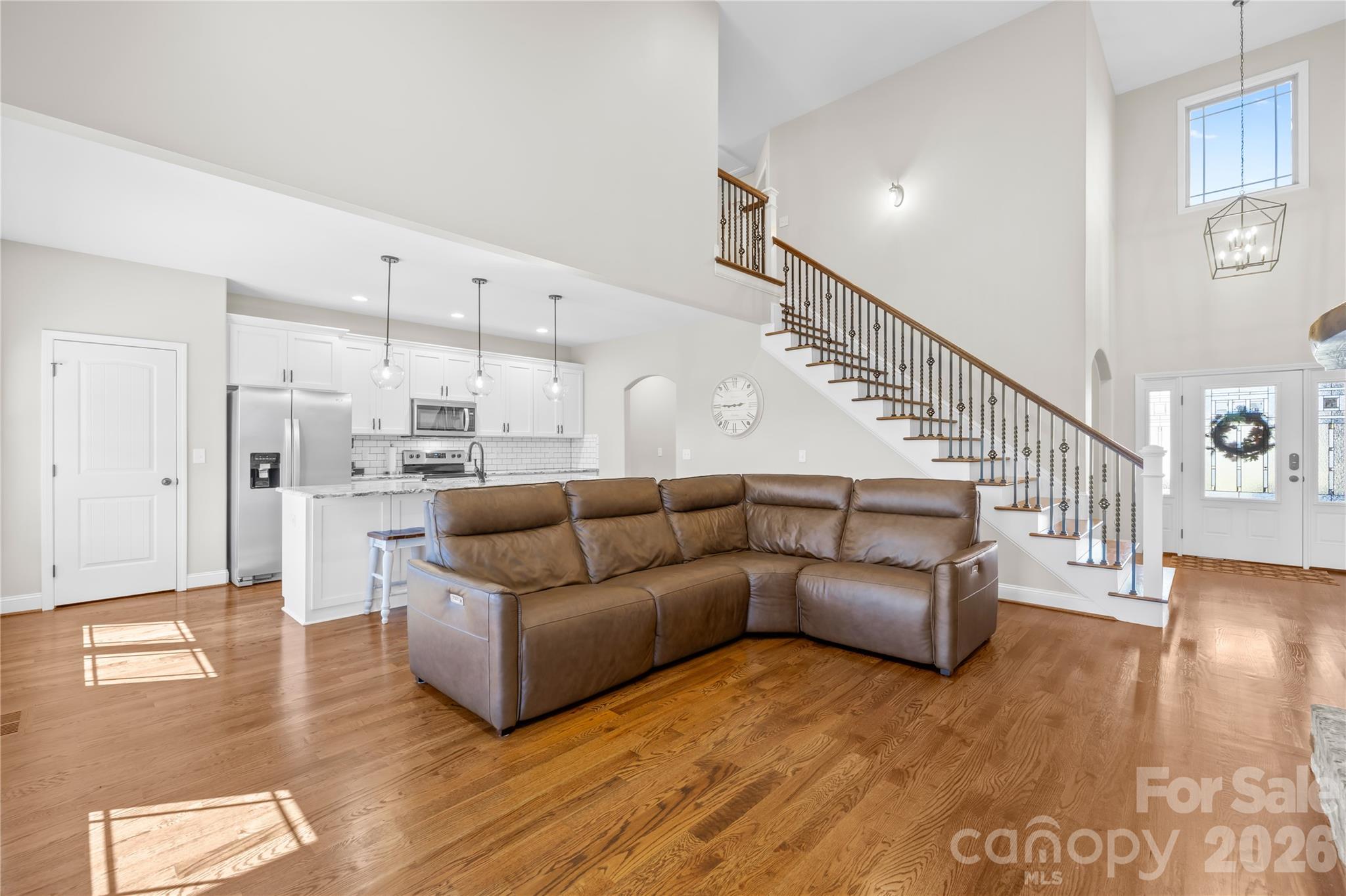 895 Oak Ridge Farms Circle Newton, NC 28658 - Photo 15 of 43 a living room with furniture and a wooden floor