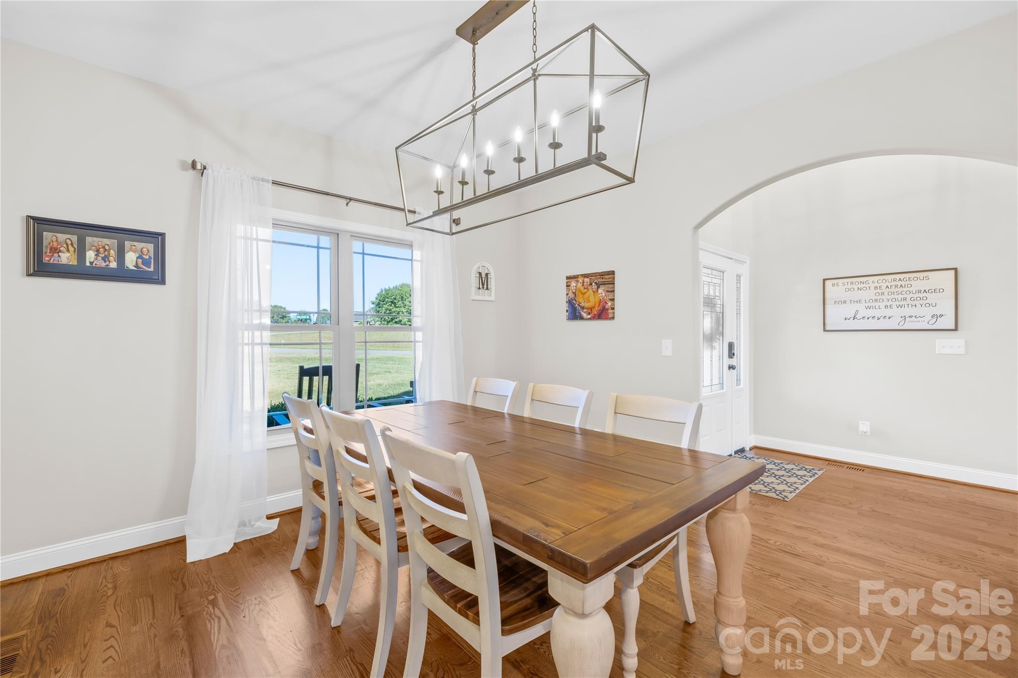 895 Oak Ridge Farms Circle Newton, NC 28658 - Photo 17 of 43 a view of a dining room with furniture and wooden floor