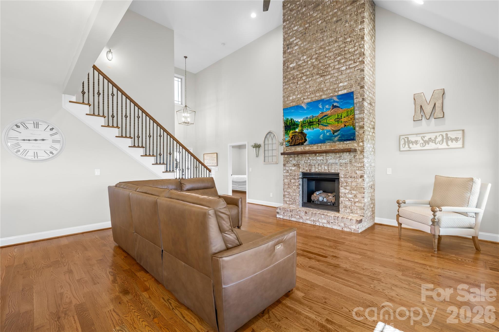 895 Oak Ridge Farms Circle Newton, NC 28658 - Photo 18 of 43 a living room with furniture and a fireplace