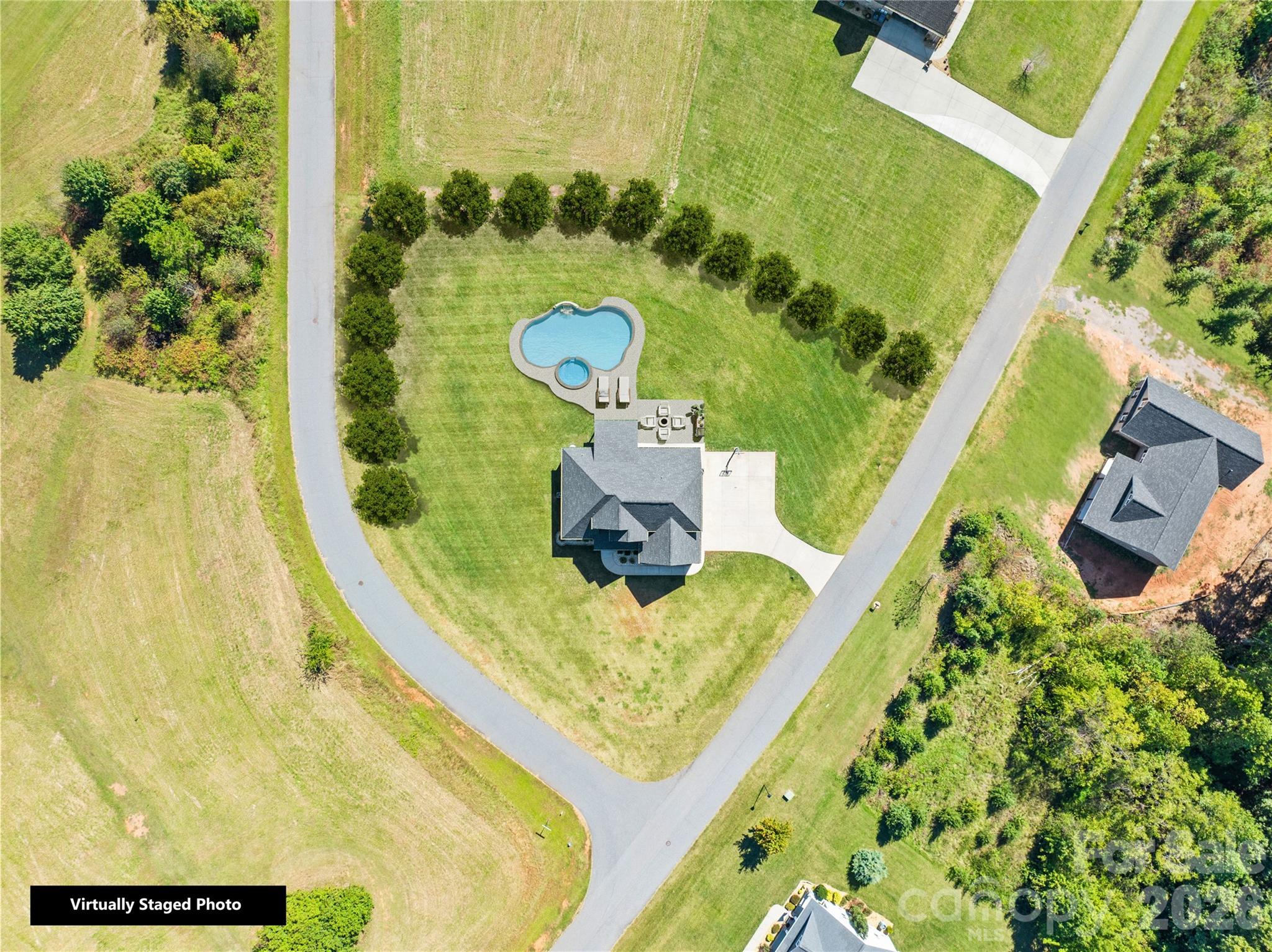 895 Oak Ridge Farms Circle Newton, NC 28658 - Photo 2 of 43 swimming pool view with a garden