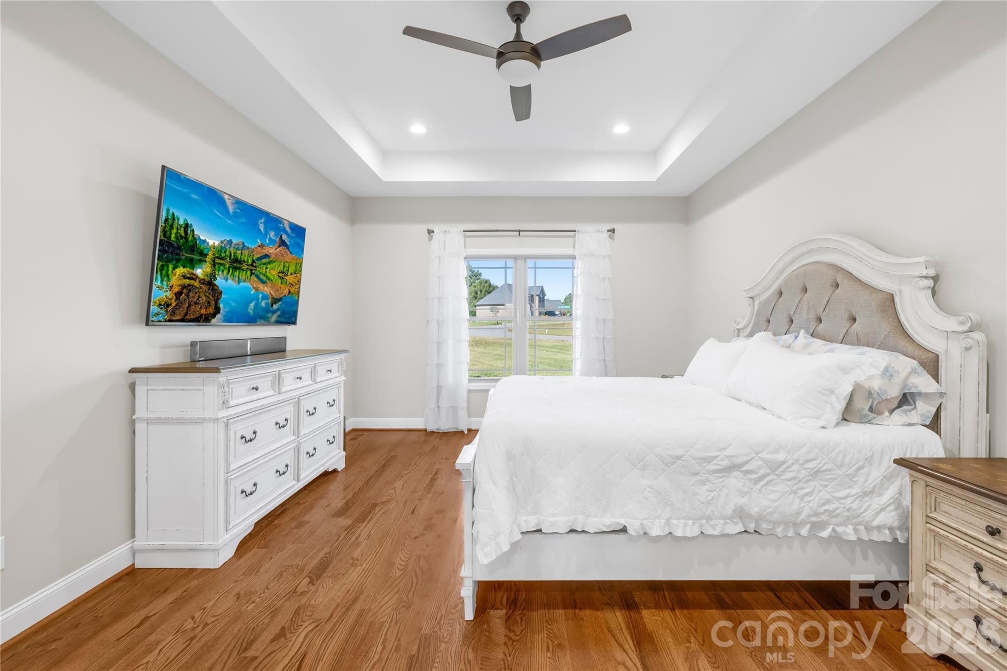 895 Oak Ridge Farms Circle Newton, NC 28658 - Photo 26 of 43 a bedroom with a bed and a flat screen tv