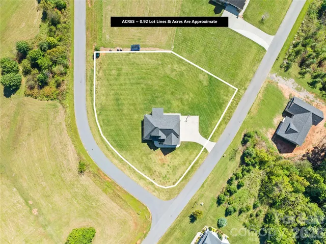 a view of a swimming pool with seating area