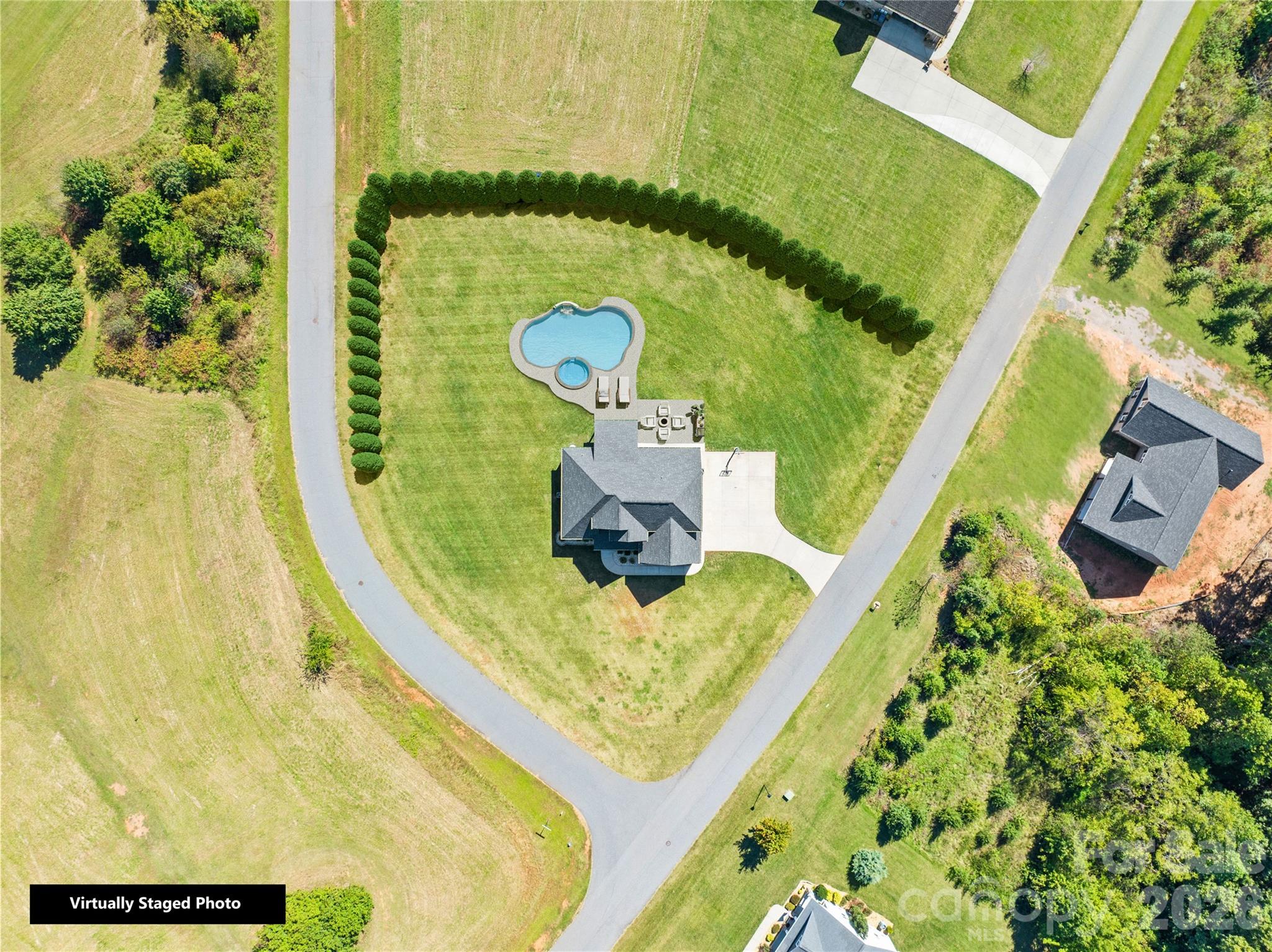 895 Oak Ridge Farms Circle Newton, NC 28658 - Photo 7 of 43 an aerial view of a swimming pool with a yard