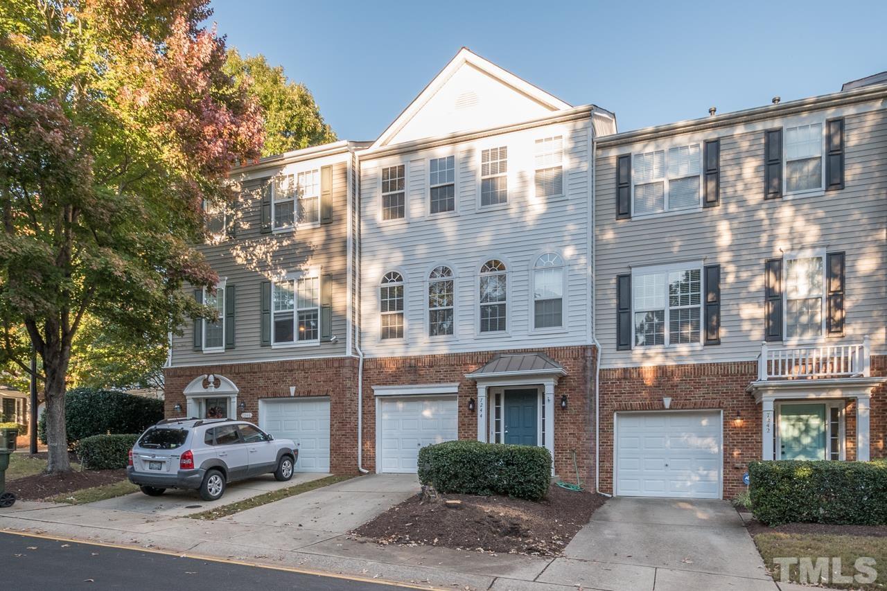 7244 Janston Drive Raleigh, NC 27613 - Photo 1 of 19 a car parked in front of a building