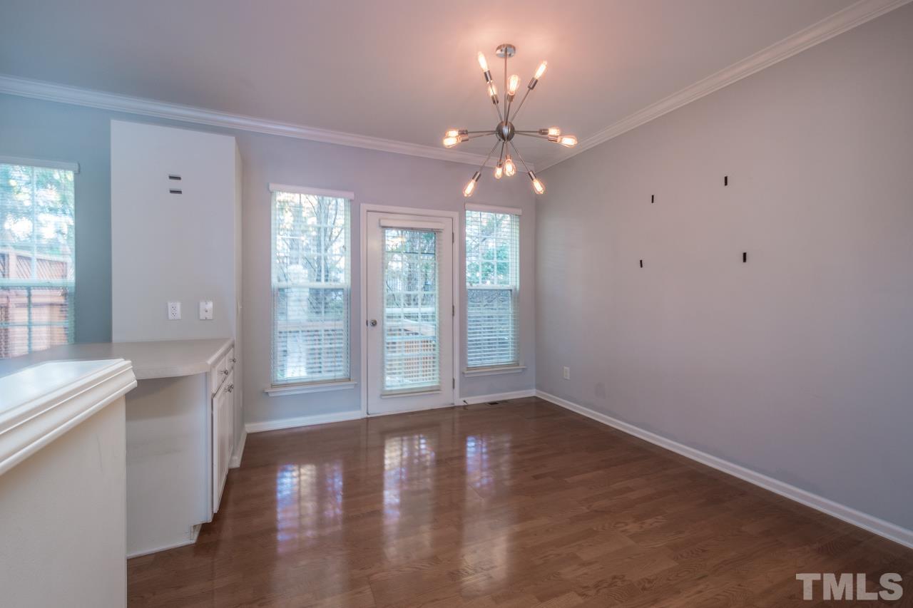 7244 Janston Drive Raleigh, NC 27613 - Photo 7 of 19 a view of an empty room with a window