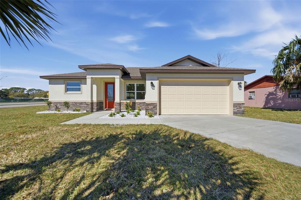 1002 Williams Street Altamonte Springs, FL 32701 - Photo 1 of 1 a front view of a house with garden