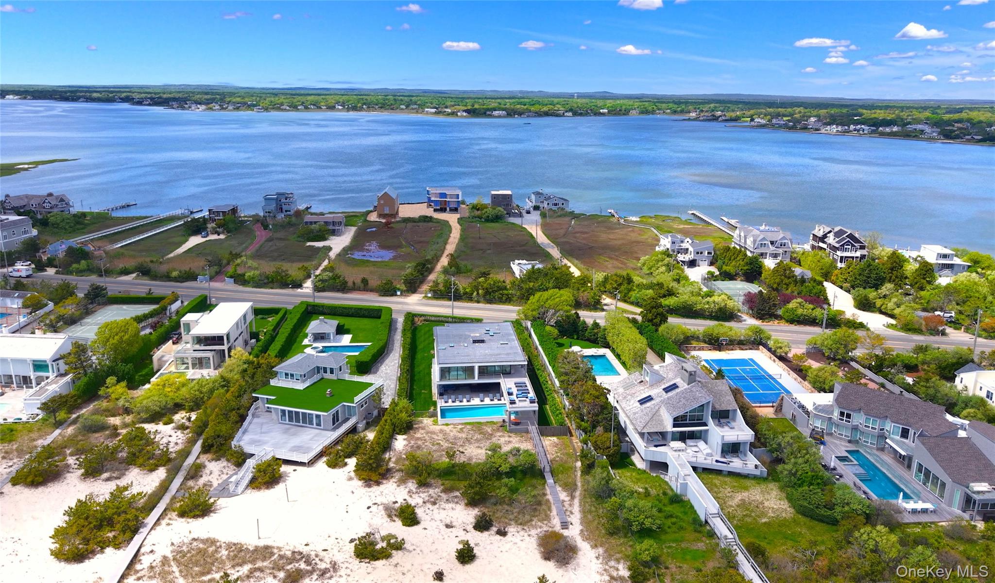 345 Dune Road Westhampton Beach, NY 11978 - Photo 2 of 34 a picture of city view with ocean view