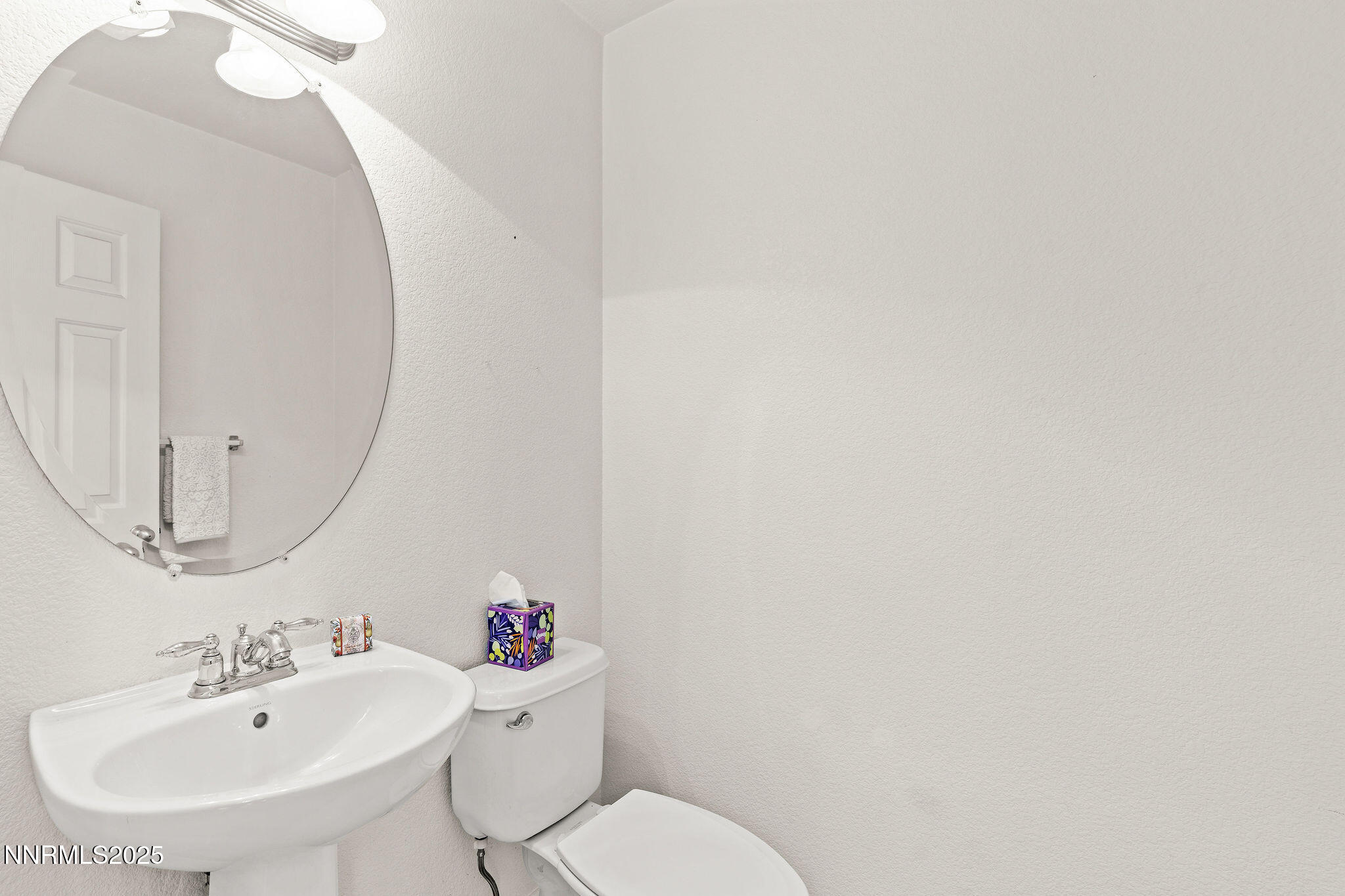 2125 Stanton Lane Reno, NV 89502 - Photo 15 of 48 a bathroom with a sink mirror and toilet