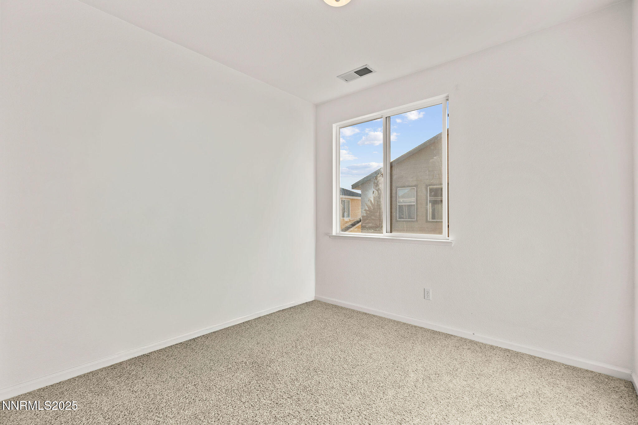 2125 Stanton Lane Reno, NV 89502 - Photo 27 of 48 an empty room with a window